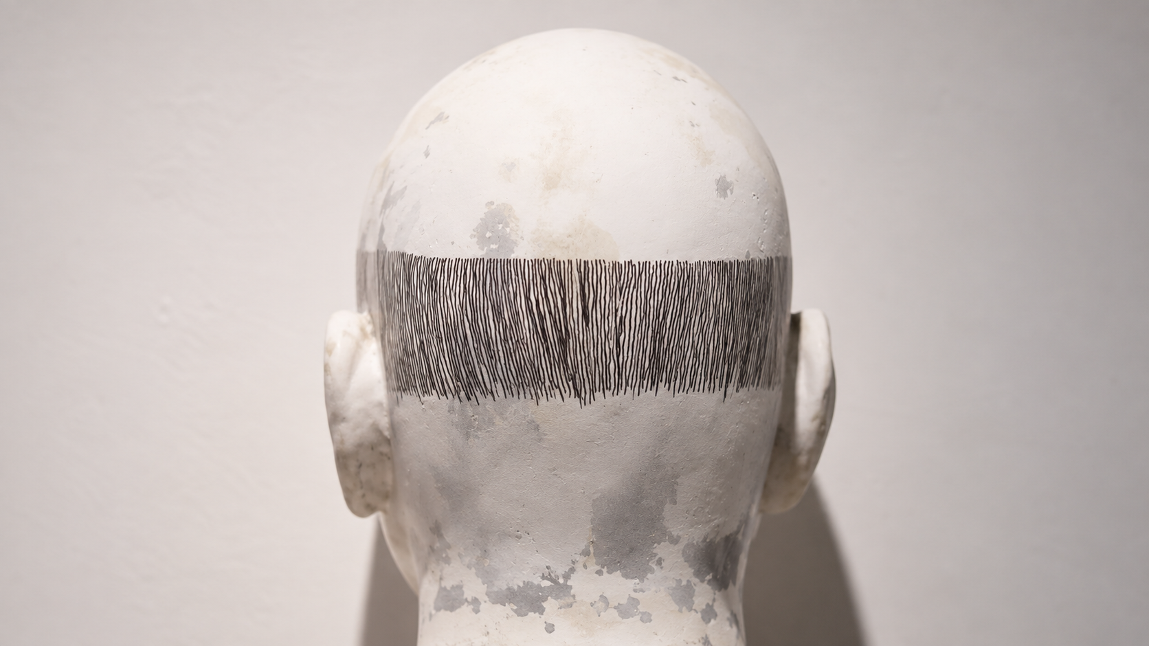Weathered Plaster Head with Charcoal Band.png