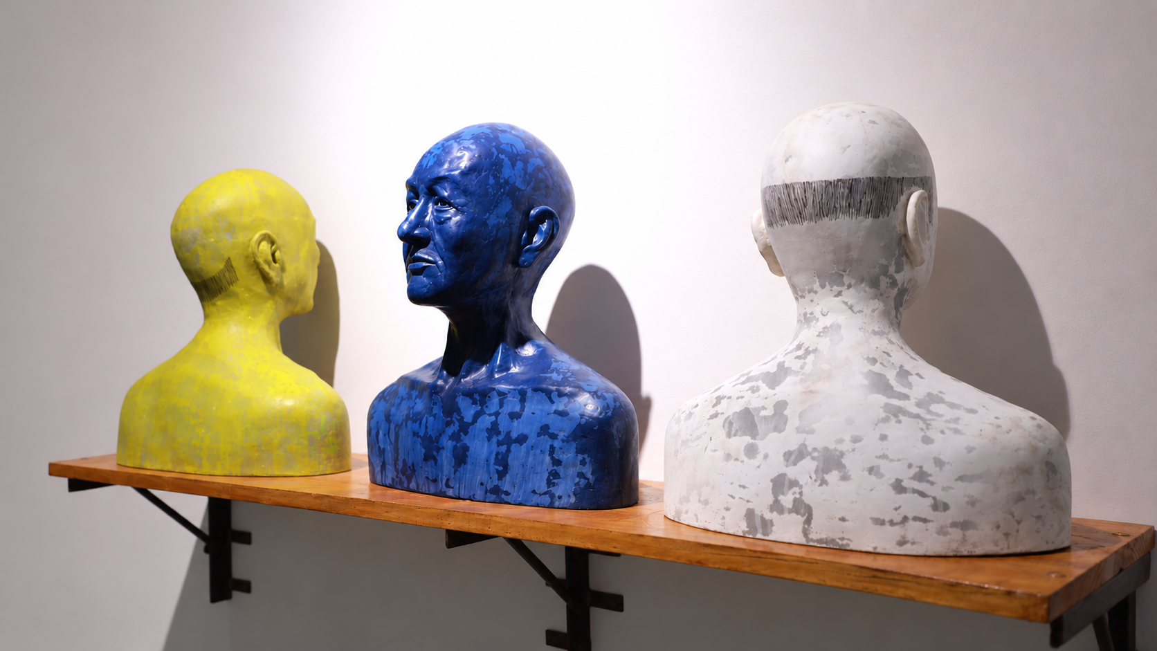 Gallery Shelf of Sculptural Busts.png