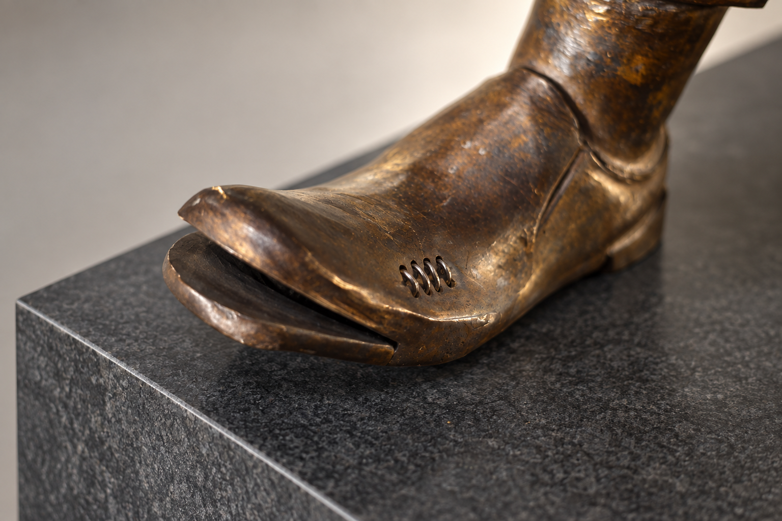 Bronze Split-Toe Sculpture on Stone.png