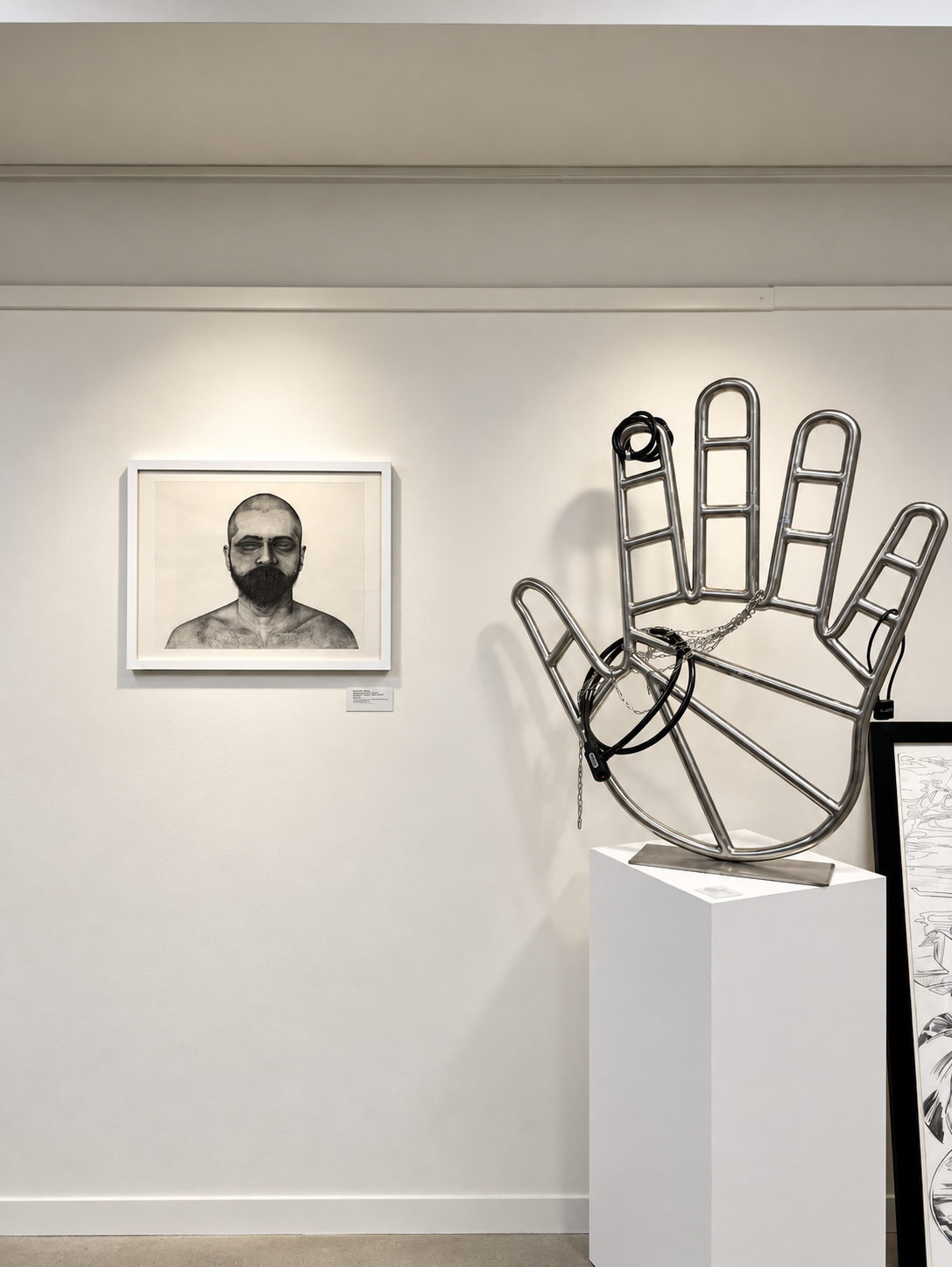 Modern Gallery Display with Sculptural Hand.png