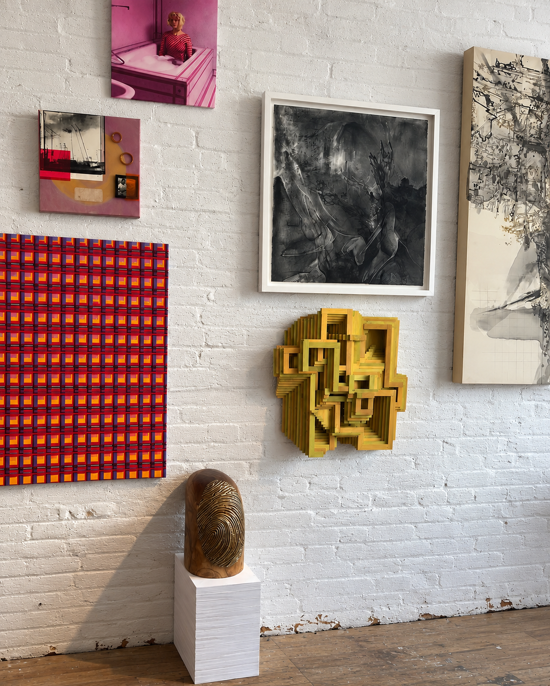 Curated Gallery Wall with Sculptural Pedestal.png