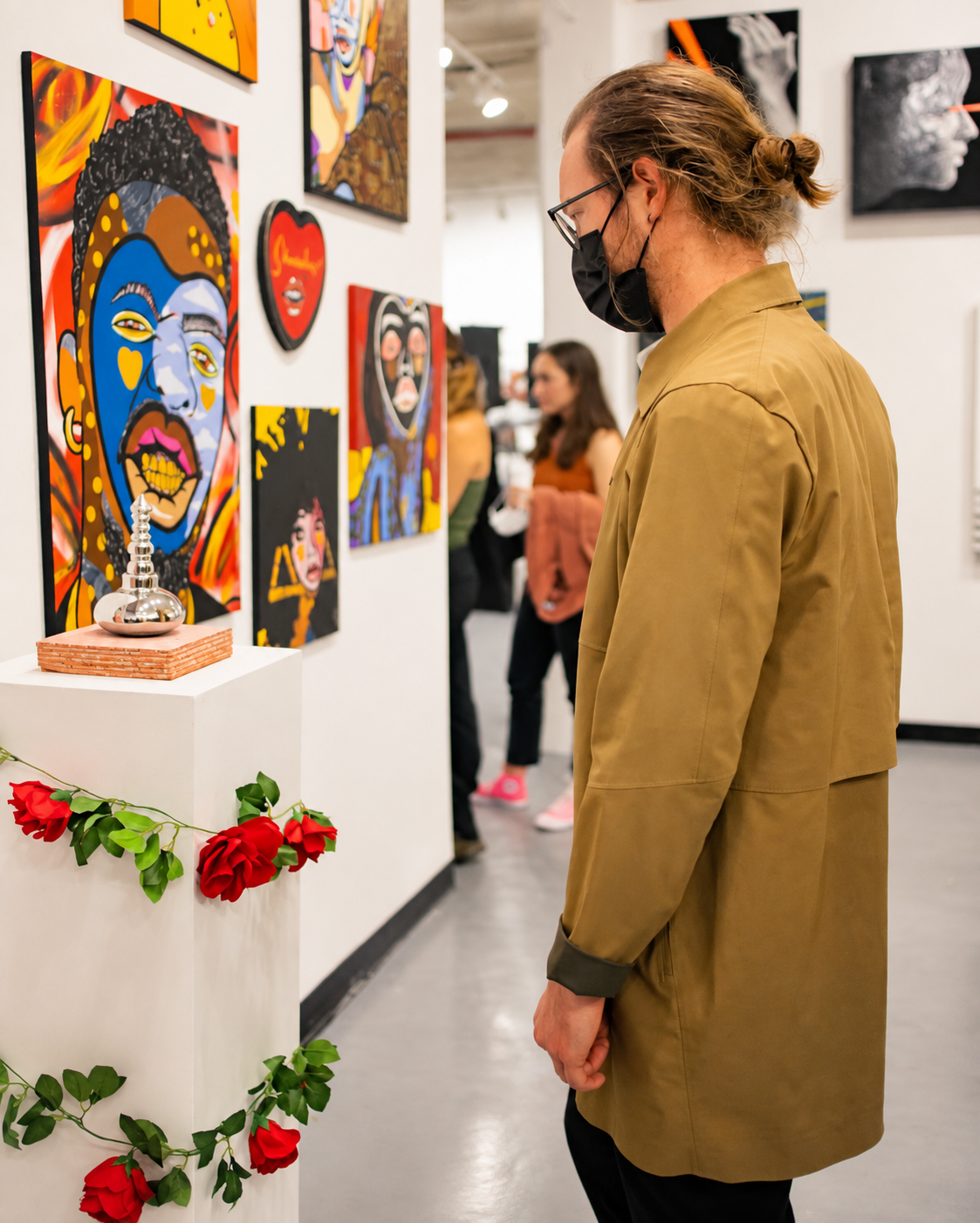 Contemplative Gallery Visitor Among Vibrant Art.png