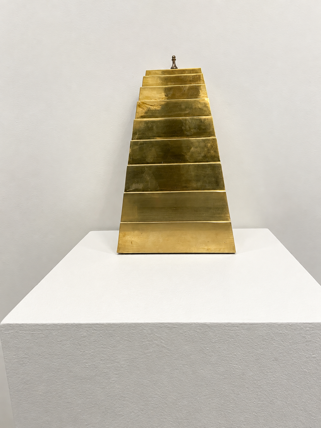 Brass Stepped Pyramid Sculpture in Gallery.png