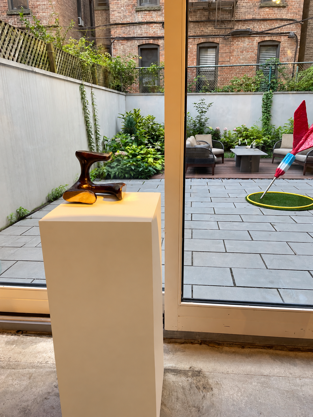 Gallery Sculpture Over Urban Courtyard.png