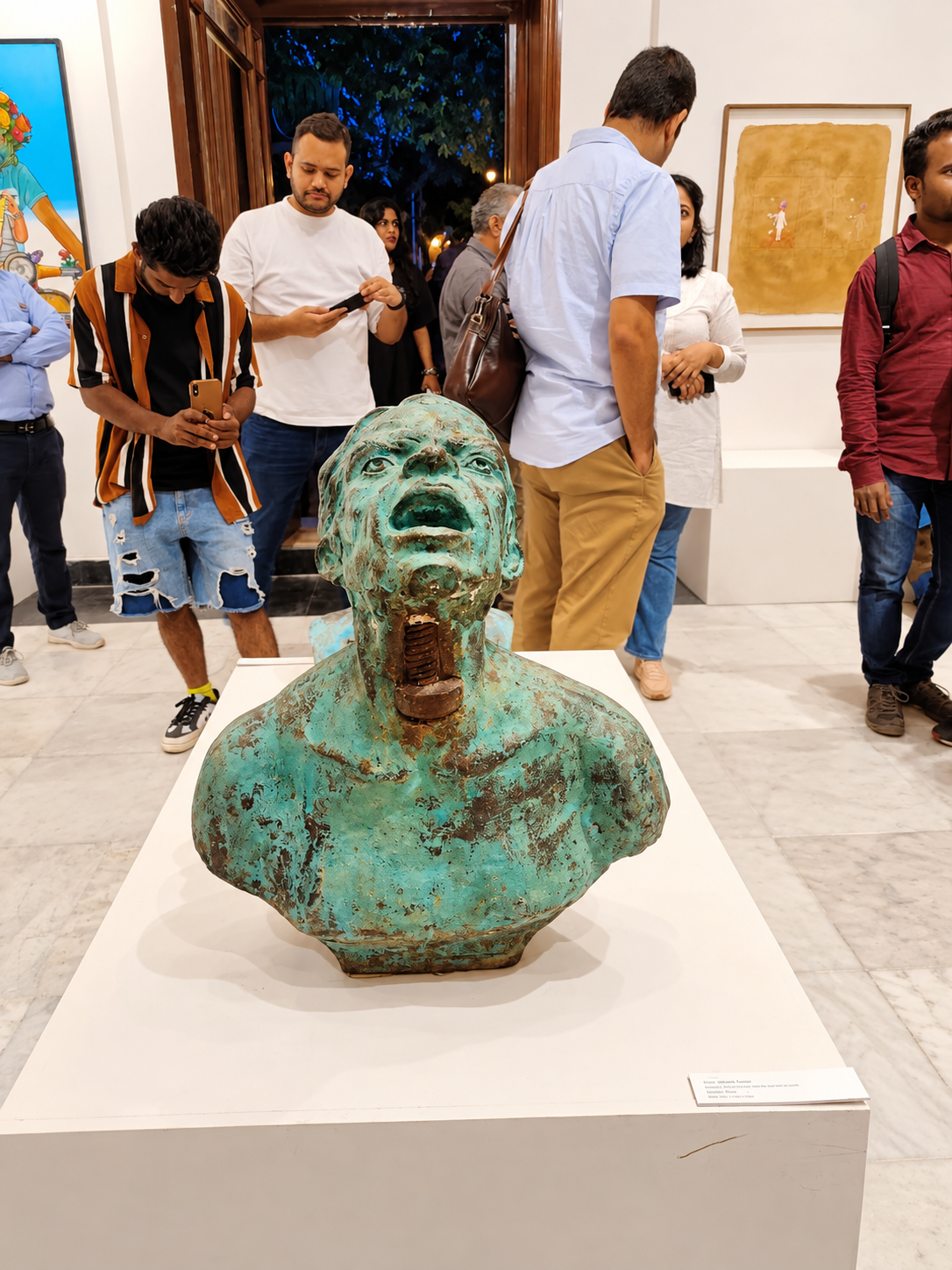 Verdigris Bust at the Gallery Exhibition.png