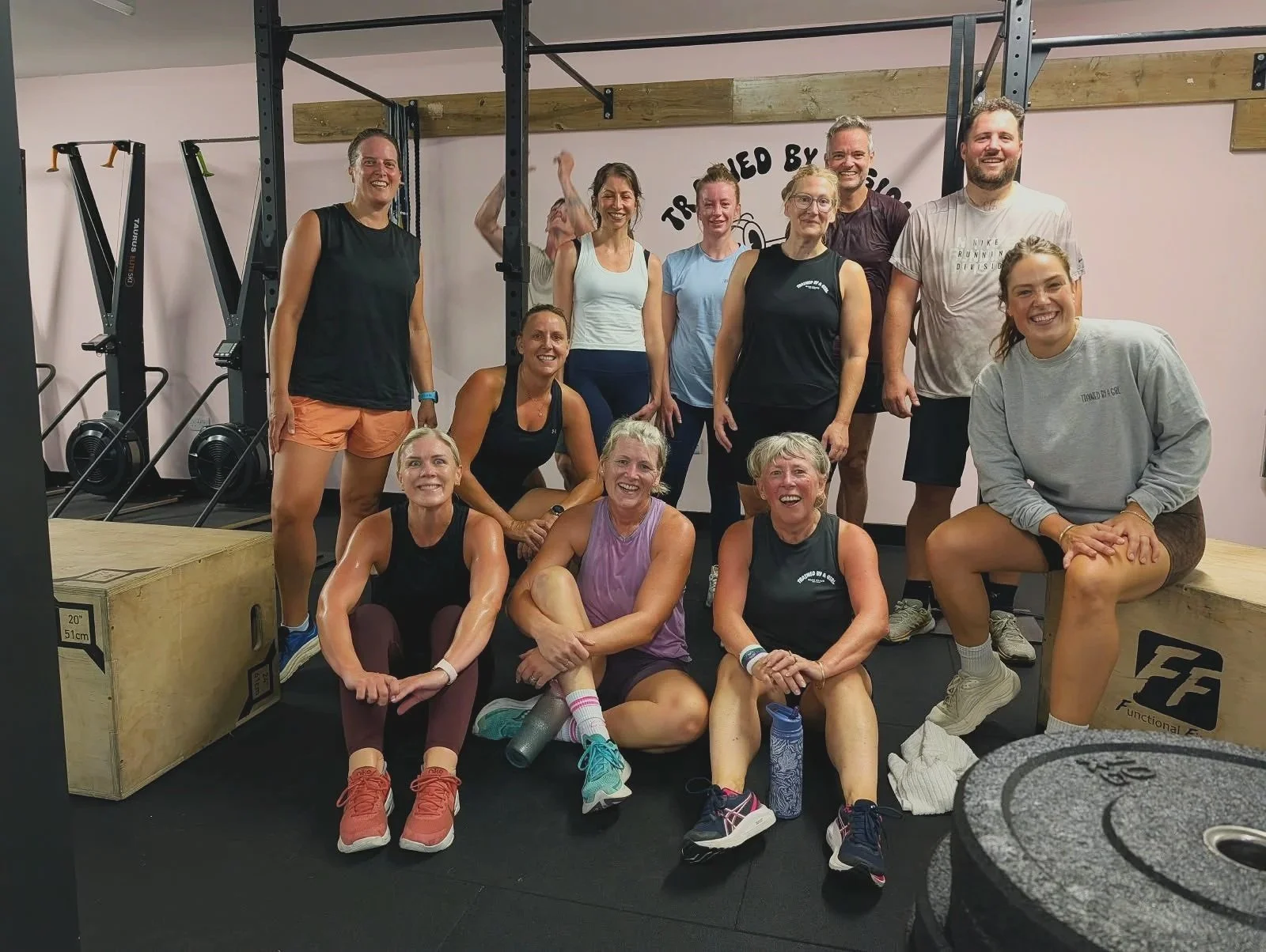 Trained by a Girl community in the gym