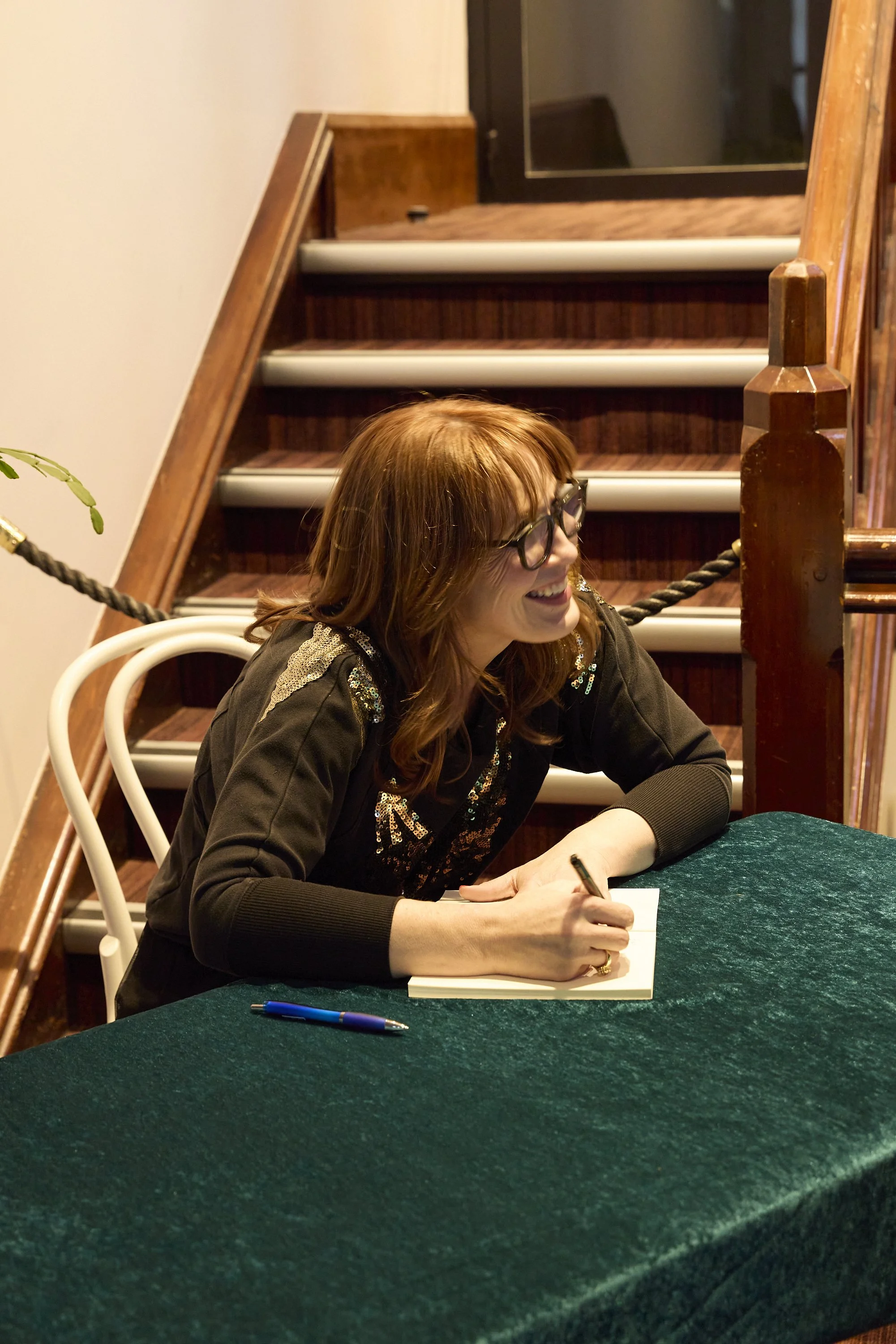 Anna signs copies of Hush