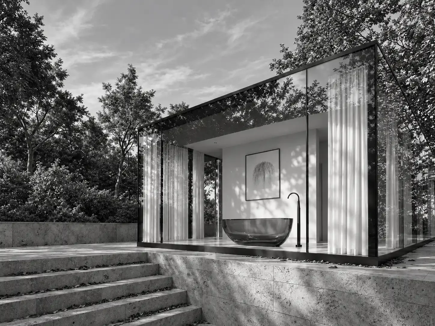 Modern glass-enclosed outdoor bathroom with a bathtub, surrounded by trees and bushes, with a framed artwork on the wall and steps leading up to it.