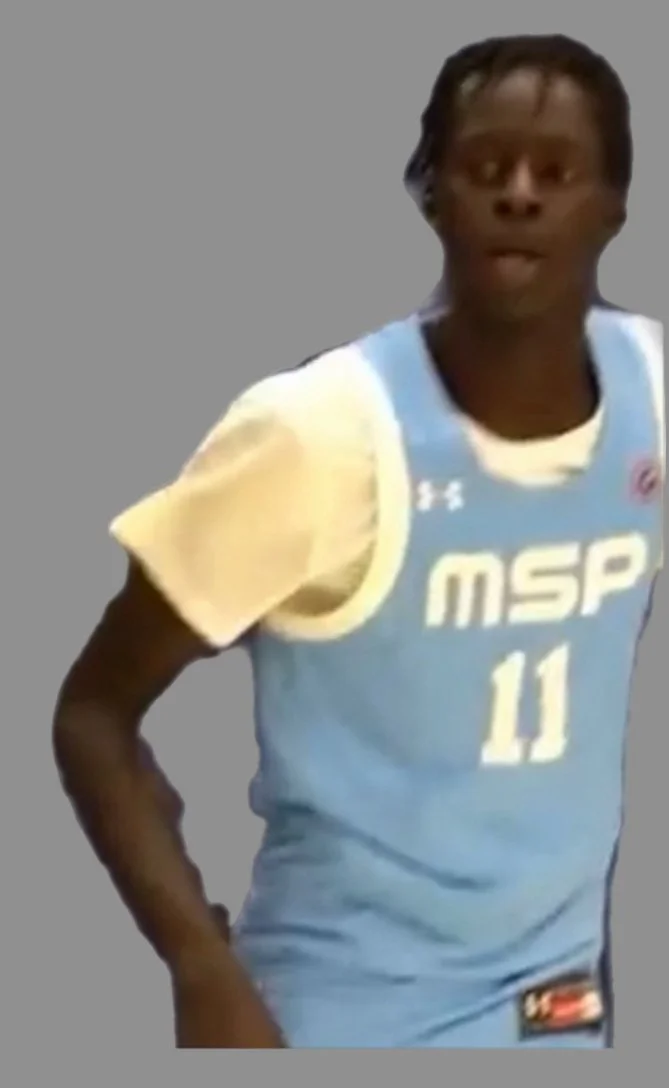 A basketball player in a blue and yellow uniform with the number 11, standing against a plain background.