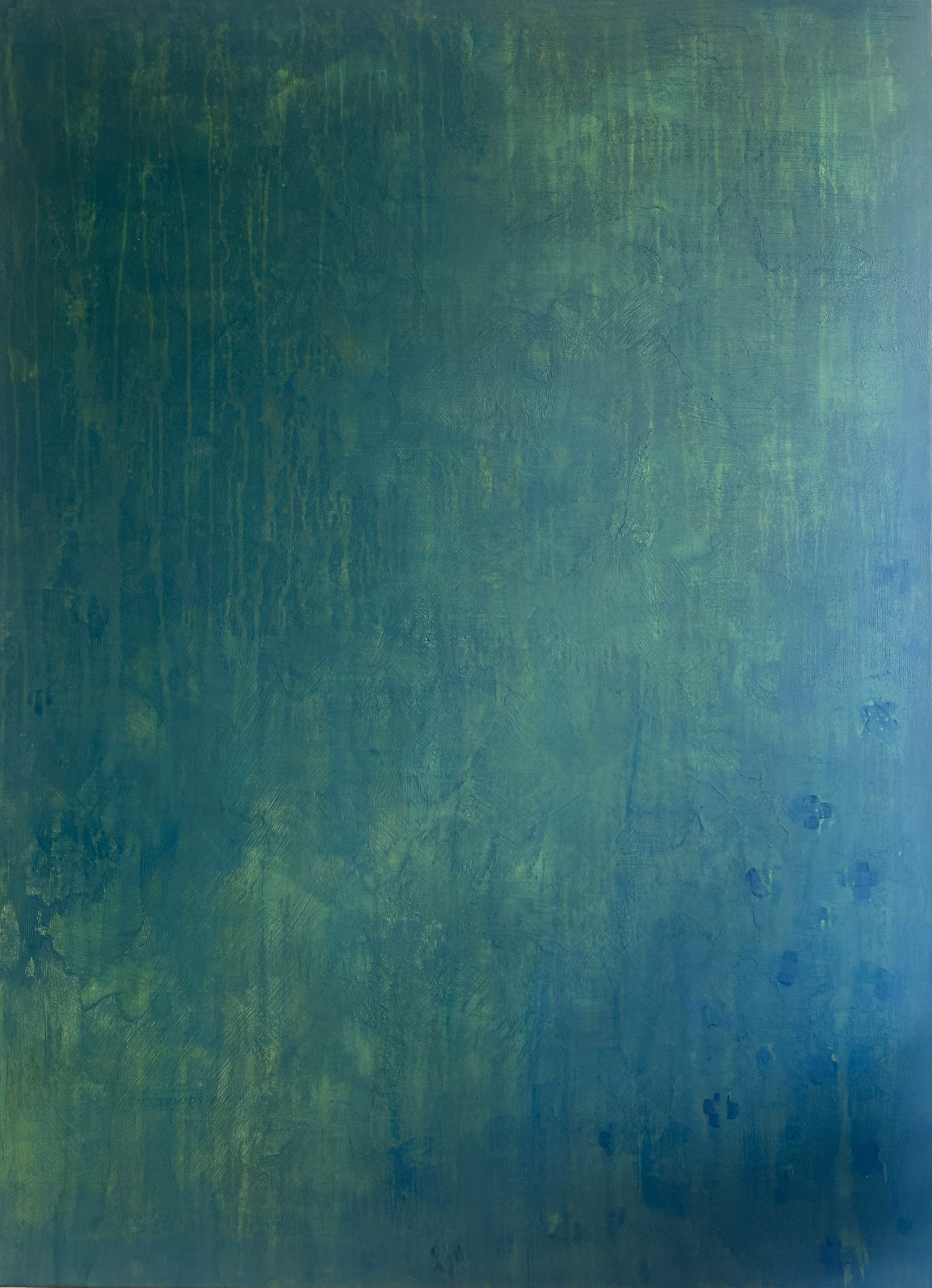A textured wall painted in shades of blue and green.