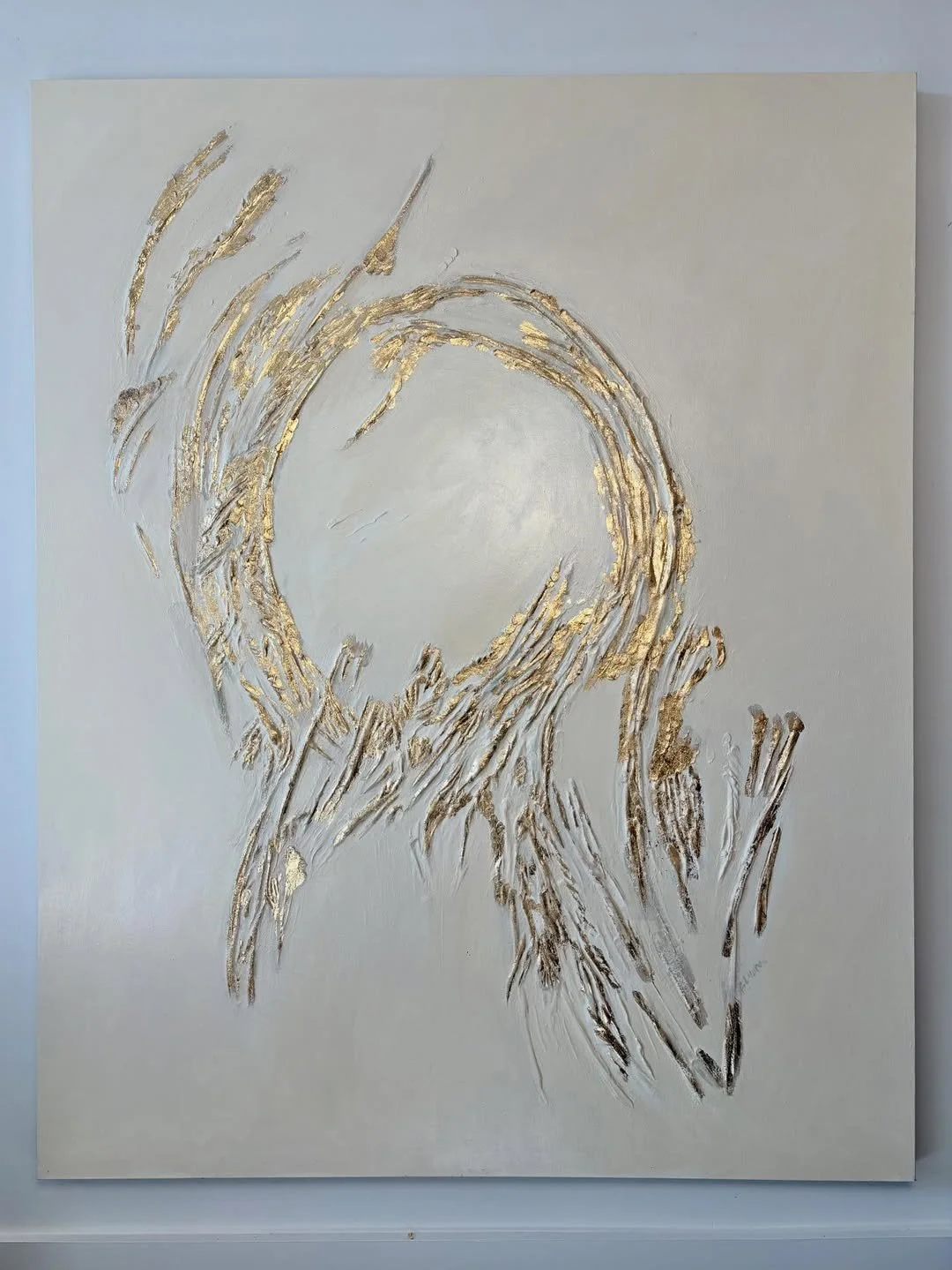 Abstract painting with gold and silver accents on a white background, featuring swirling and textured brush strokes.