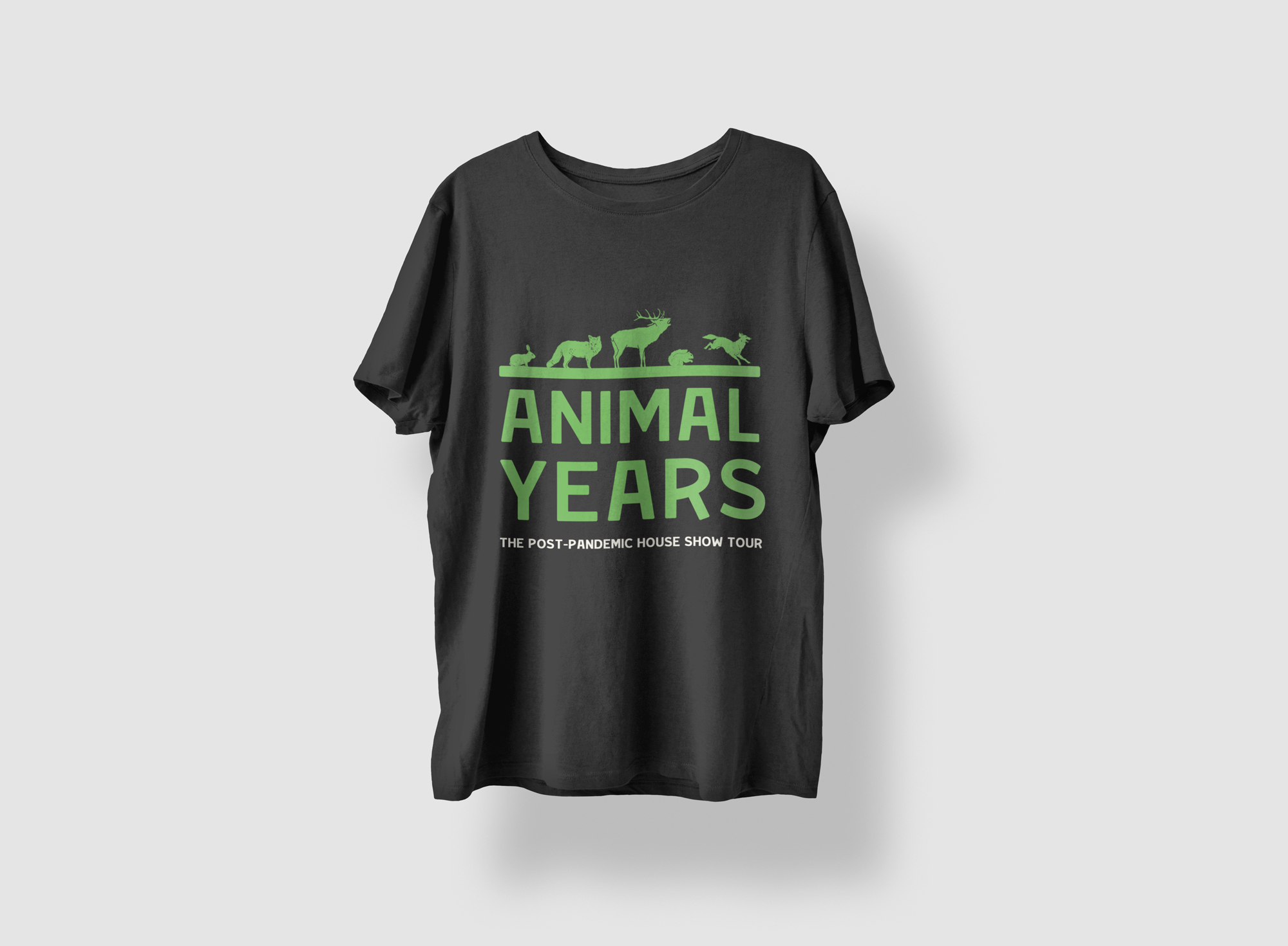 Black Animal Years T-shirt featuring green wildlife silhouettes and the text “The Post-Pandemic House Show Tour.”