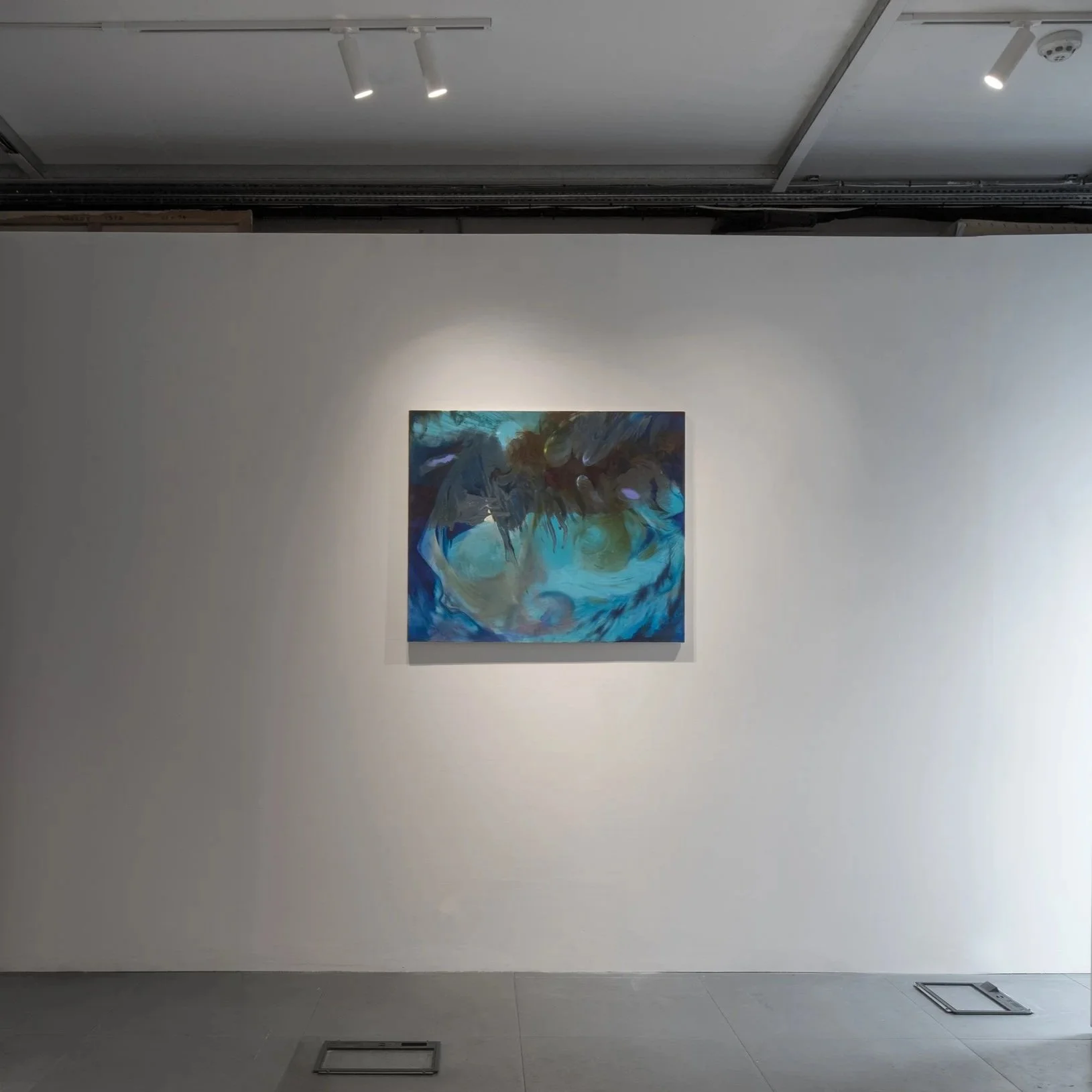 Installation view of Kika Sroka-Miller's Go whaling (2026) in Commencement / Commandment at Prokofiev Studio, London, featuring swirling blue, turquoise and dark organic forms in a painting displayed on a white gallery wall.
