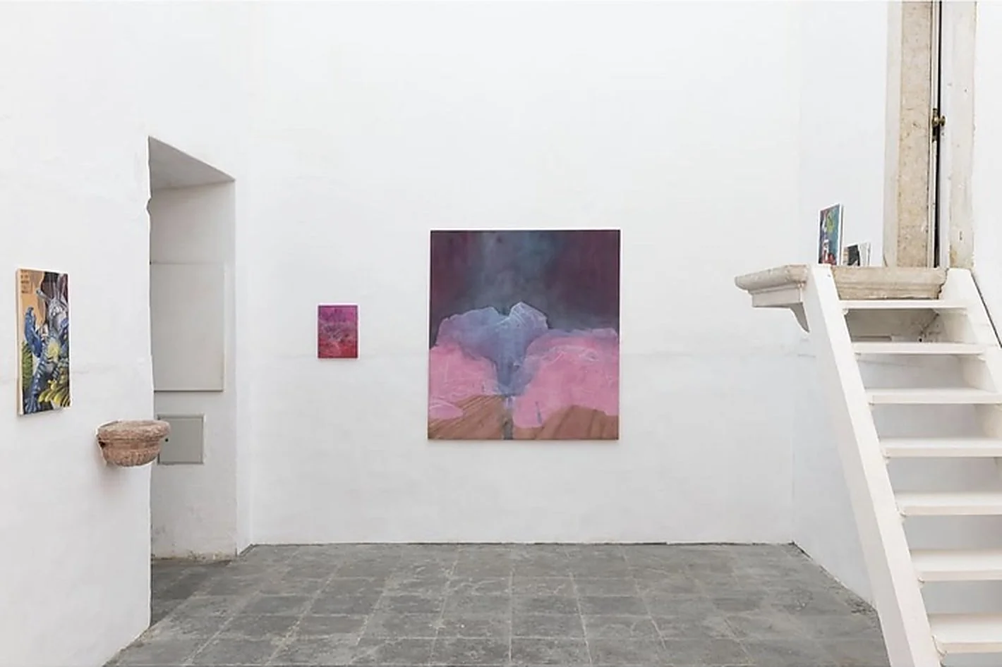 Installation view of paintings by Luca Japkinas, including a large pink and purple composition, in Déjà Vu (2024) at Dialogue Gallery, Lisbon.