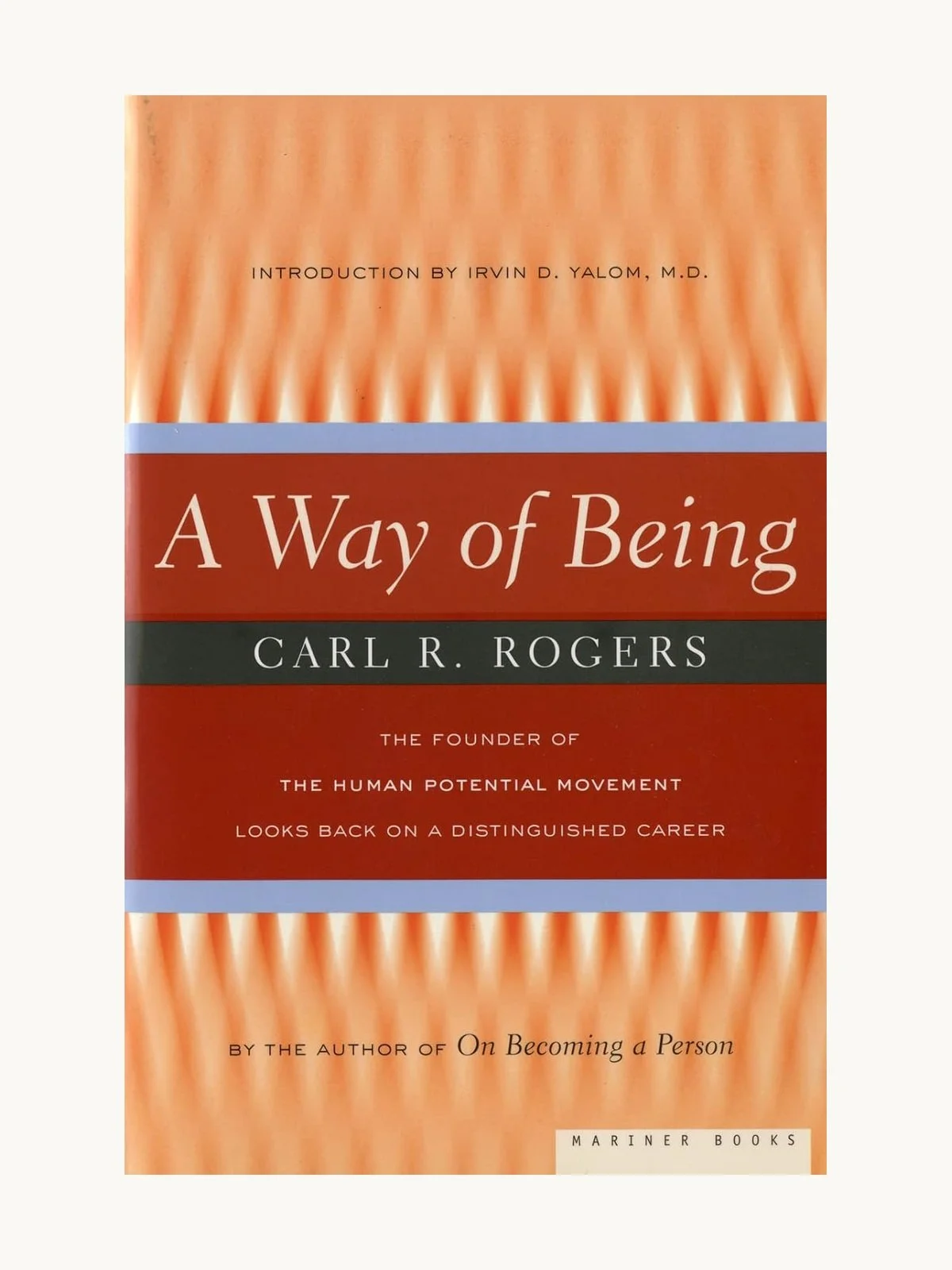 Book cover for "A Way of Being" by Carl R. Rogers, with an orange and brown abstract background.