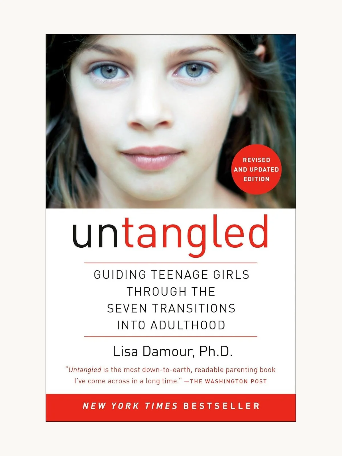 Book cover for "Untangled" by Lisa Damour, featuring a close-up of a teenage girl's face with blue eyes.