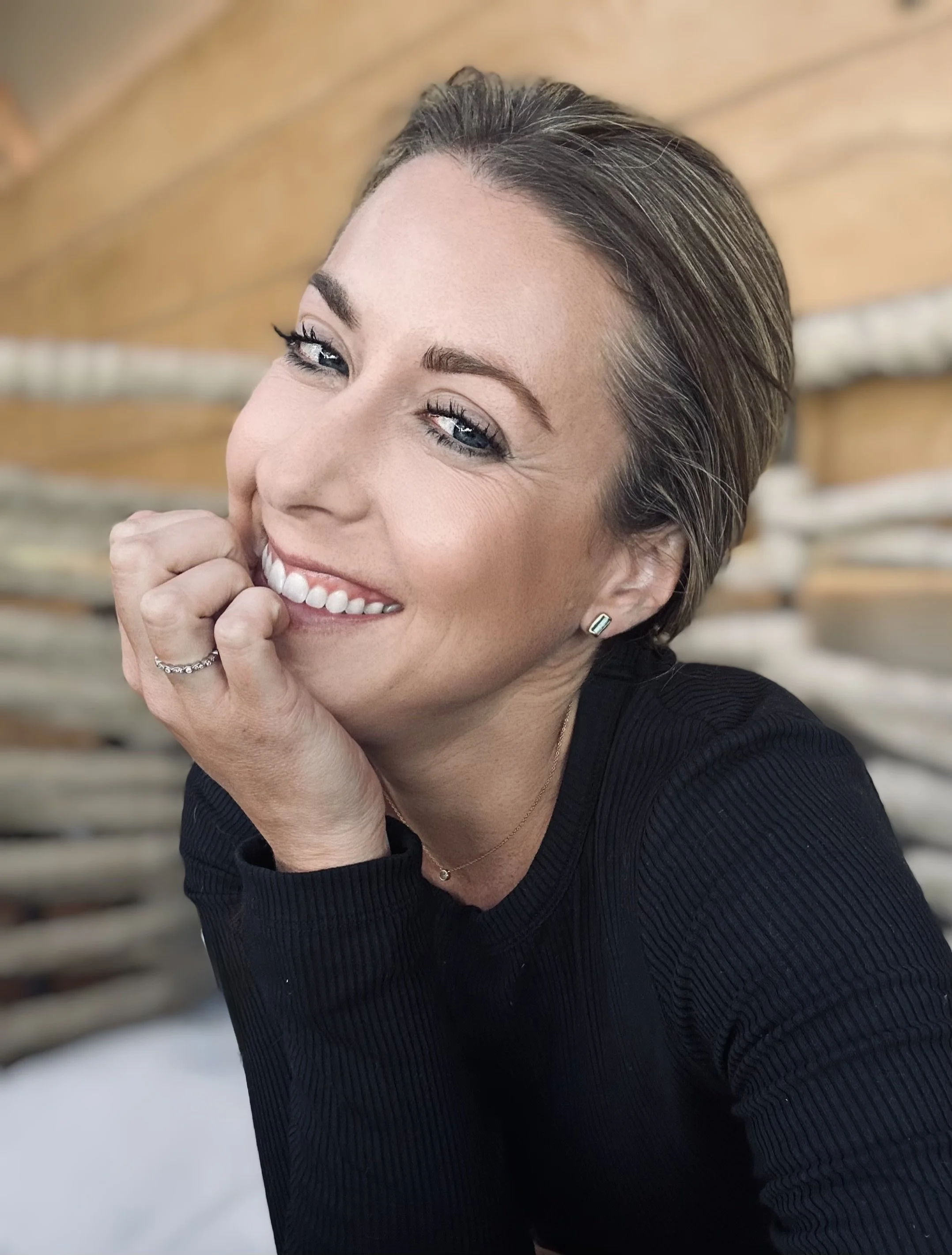 Photo of Emilie smiling and relaxed