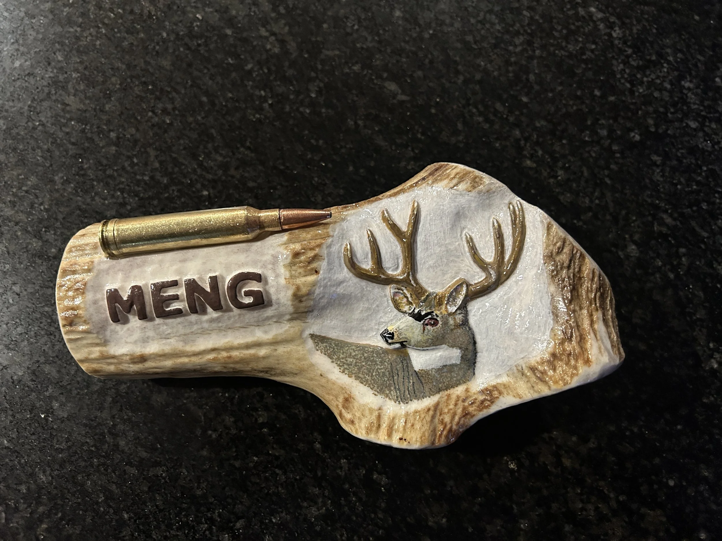 Mule deer on elk slab with customized family name.