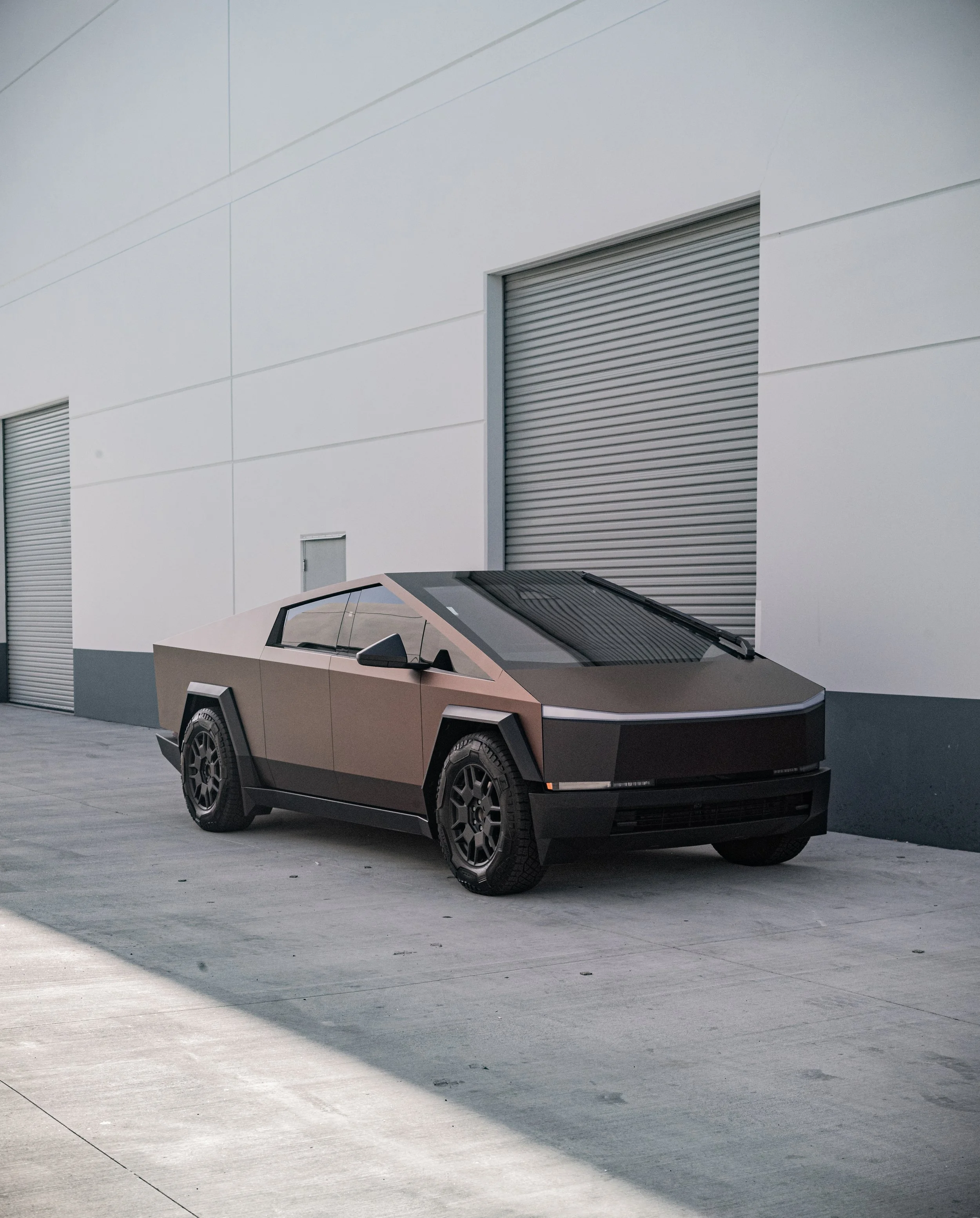 Bronze Tesla Cybertruck with color paint protection film at Xclusive Auto Customz in Santee, CA
