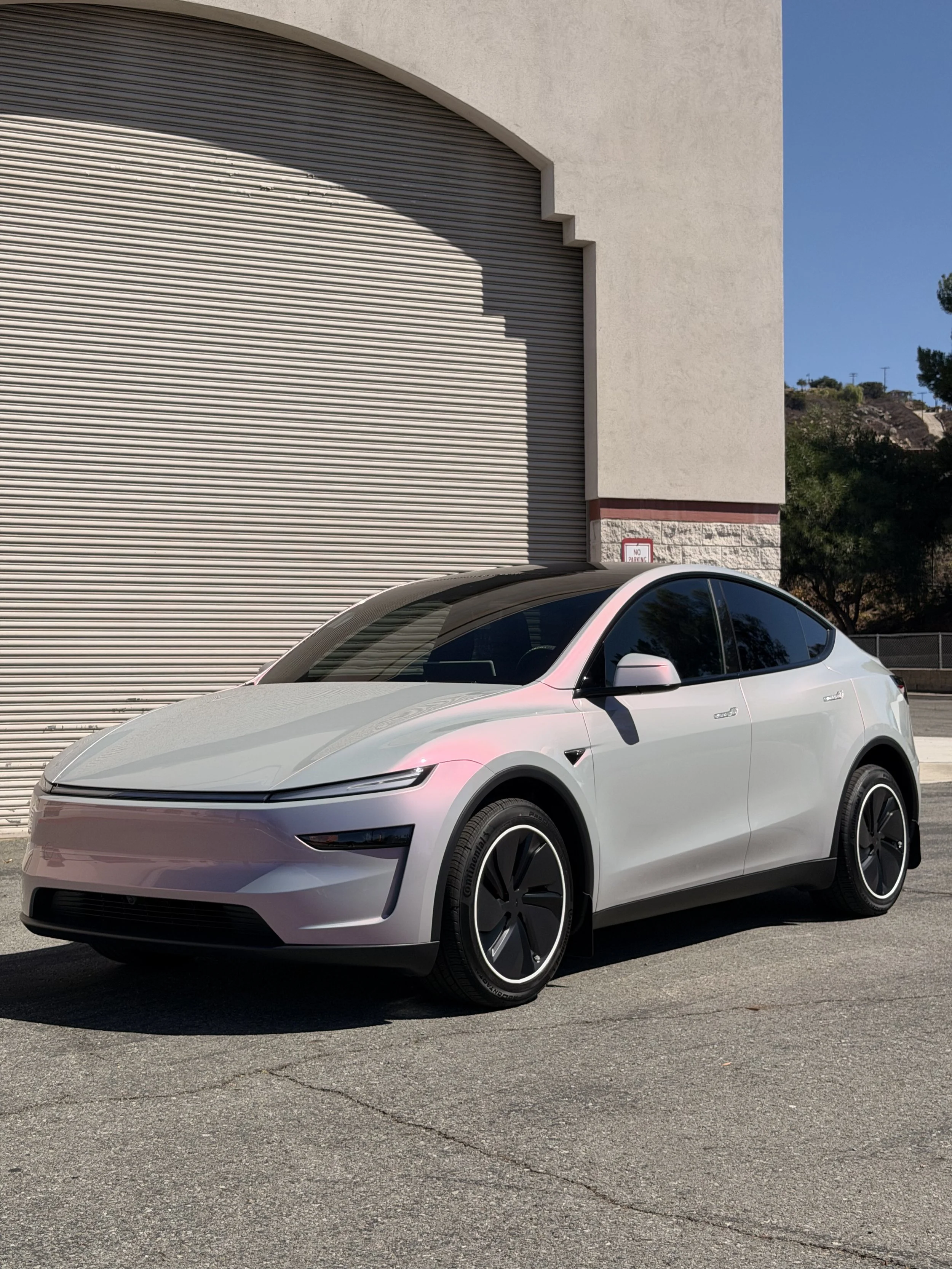 Silver Tesla with color paint protection film and black wheels at Xclusive Auto Customz in Santee, CA