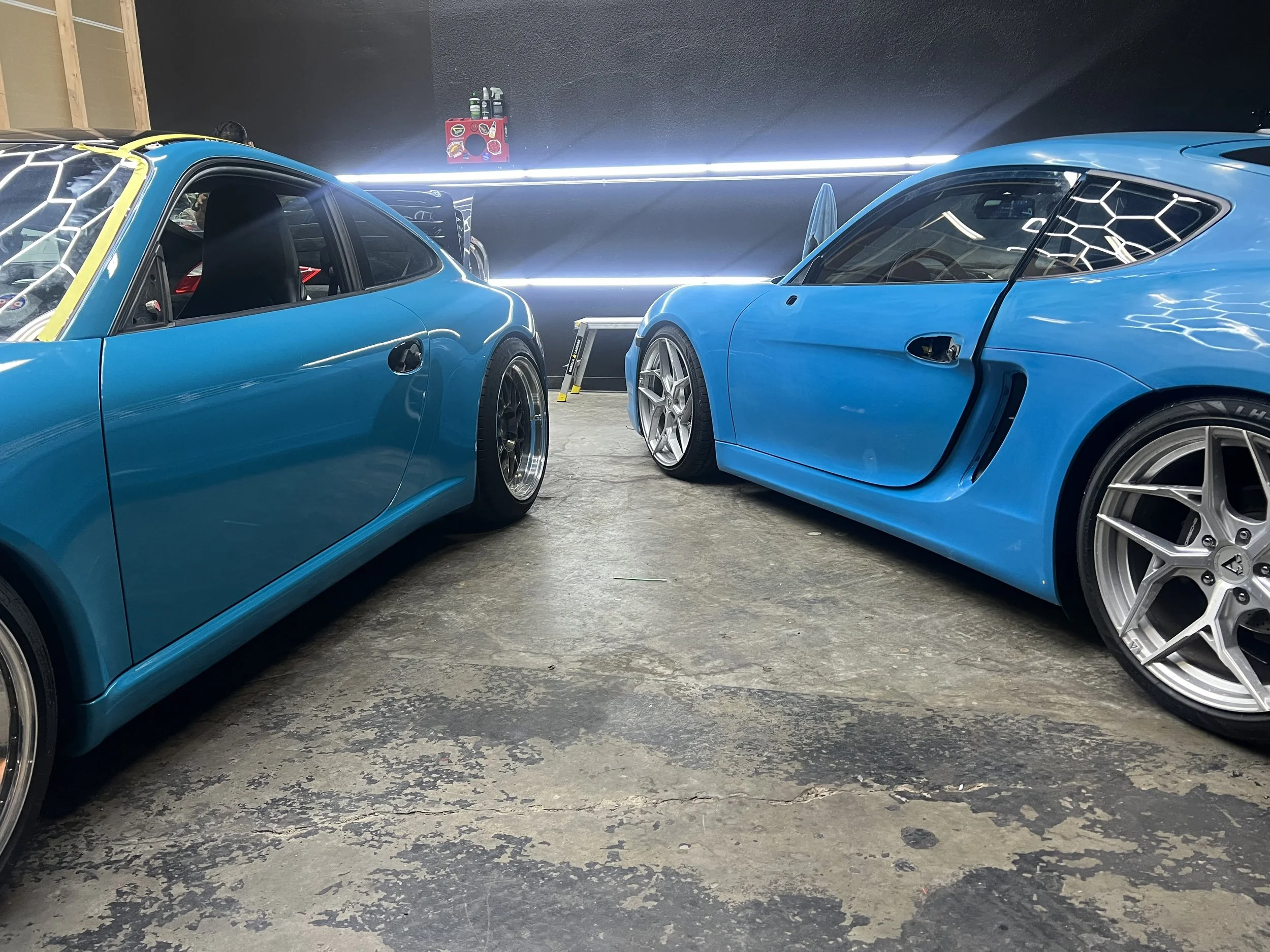 Xclusive Auto Customz shop wall sign, established 2014, in Santee, CA