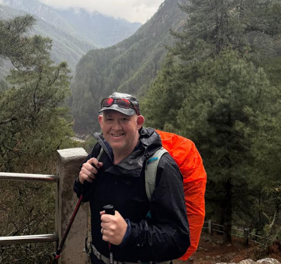 Luke Passmore on the Hillary Bridge during a hiking trip to Everest Base Camp.