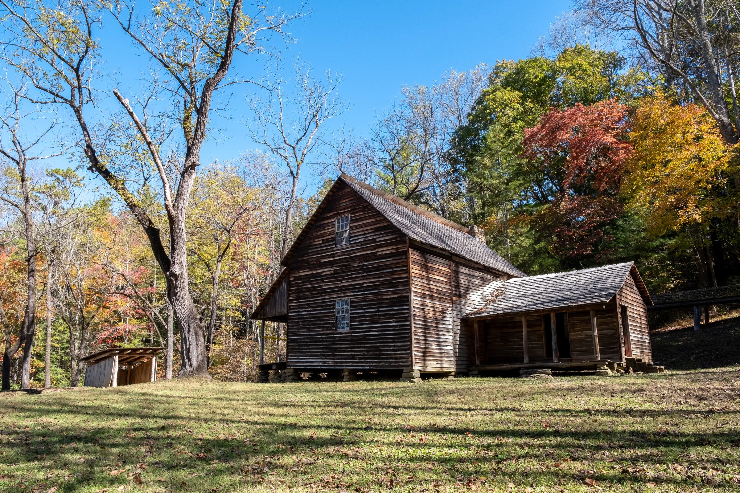 Built in the 1870's, the Tipton Place was lived in by Lizzie and Lucy Tipton, the daughters of builder "Col. Hamp" Tipton. Lizzie and Lucy taught school in the cove.