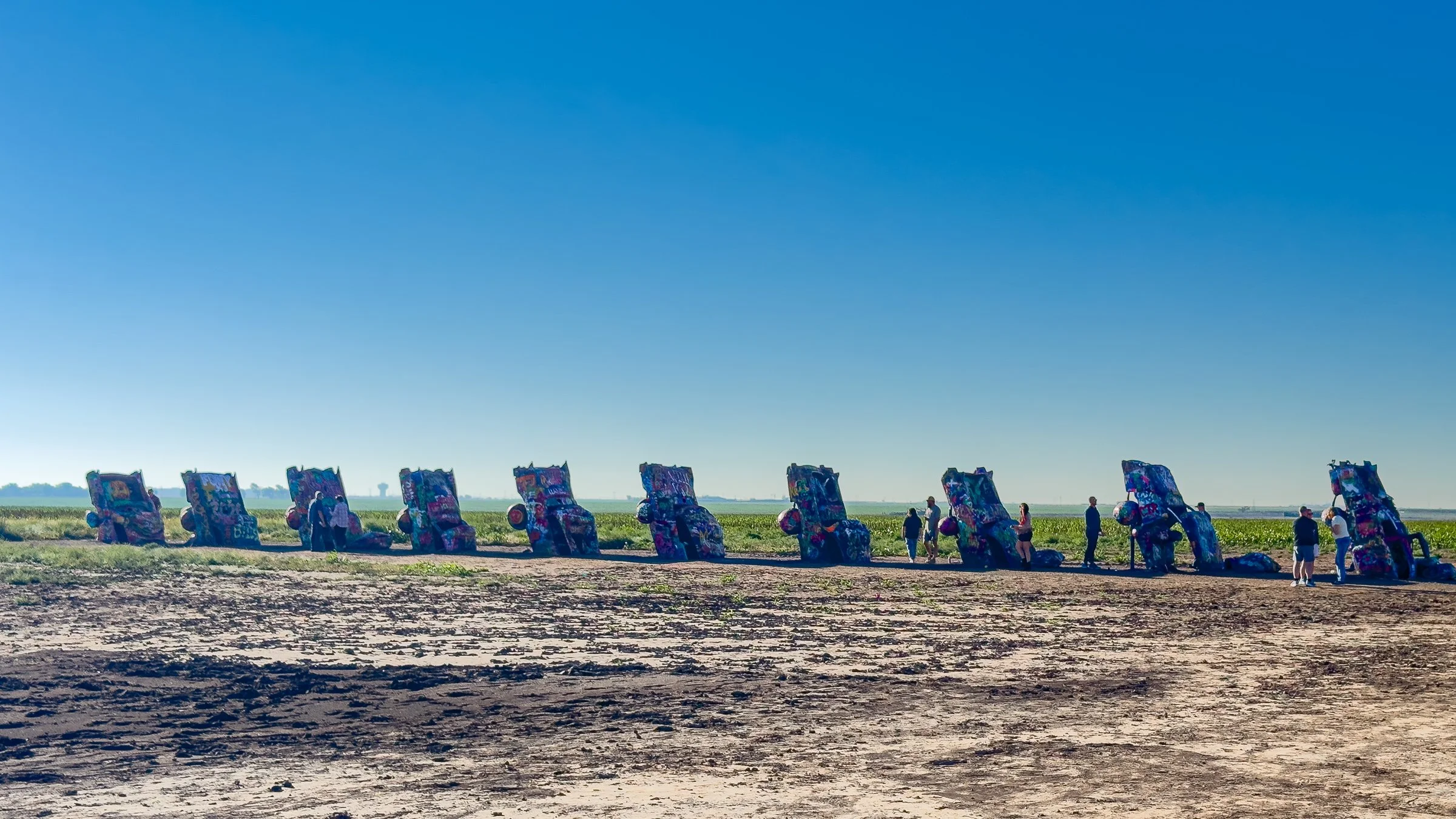 Cadillac Ranch, Amarillo, Texas: 10 vintage Cadillacs planted nose down in a field just off I-40.