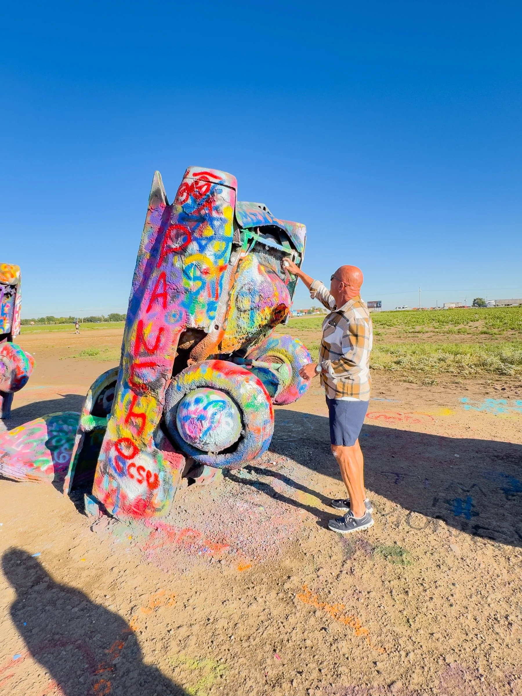Many visitors come to spray paint their own artistic vision on top of previous visitors'.