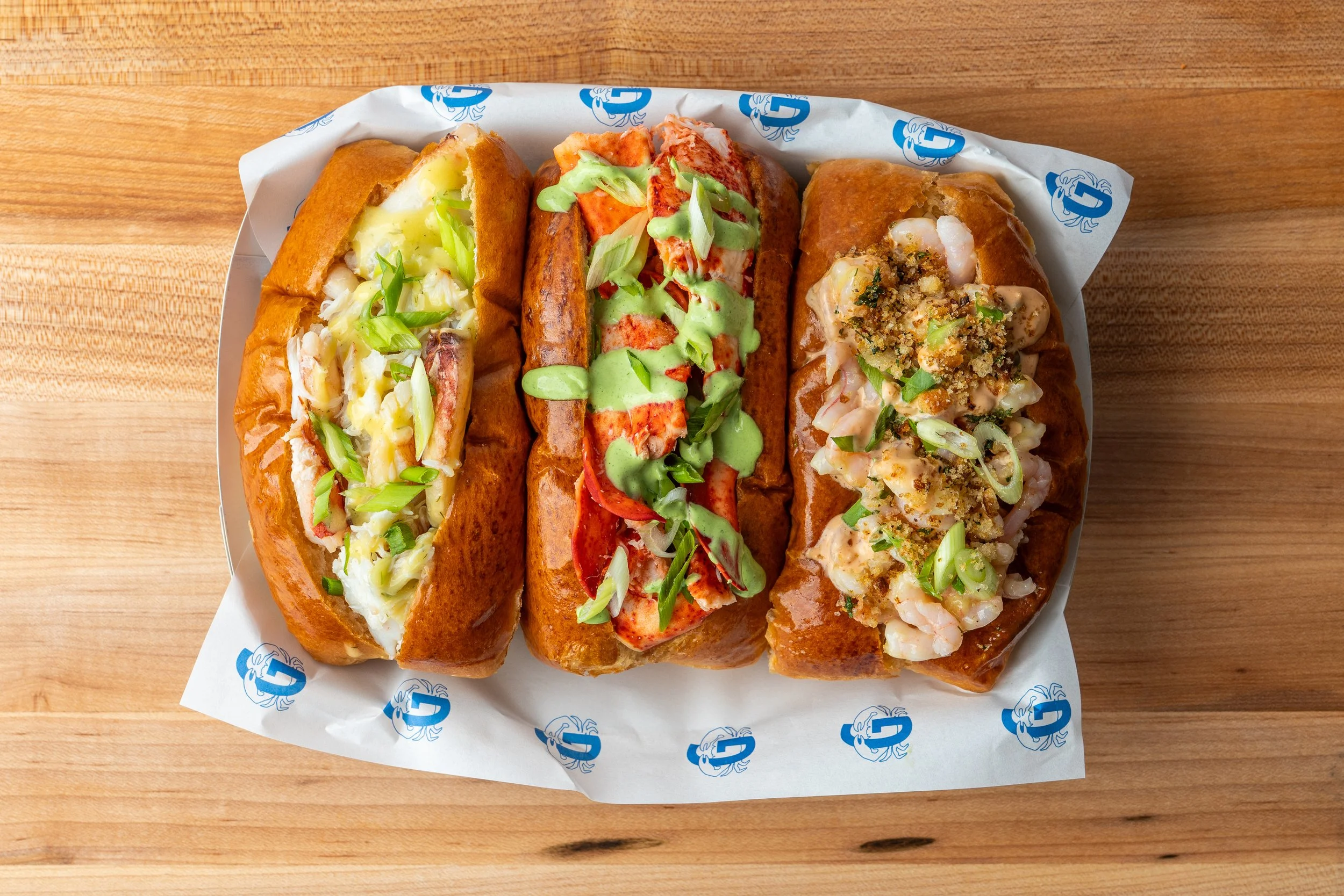 Trio of crab, lobster, and shrimp rolls