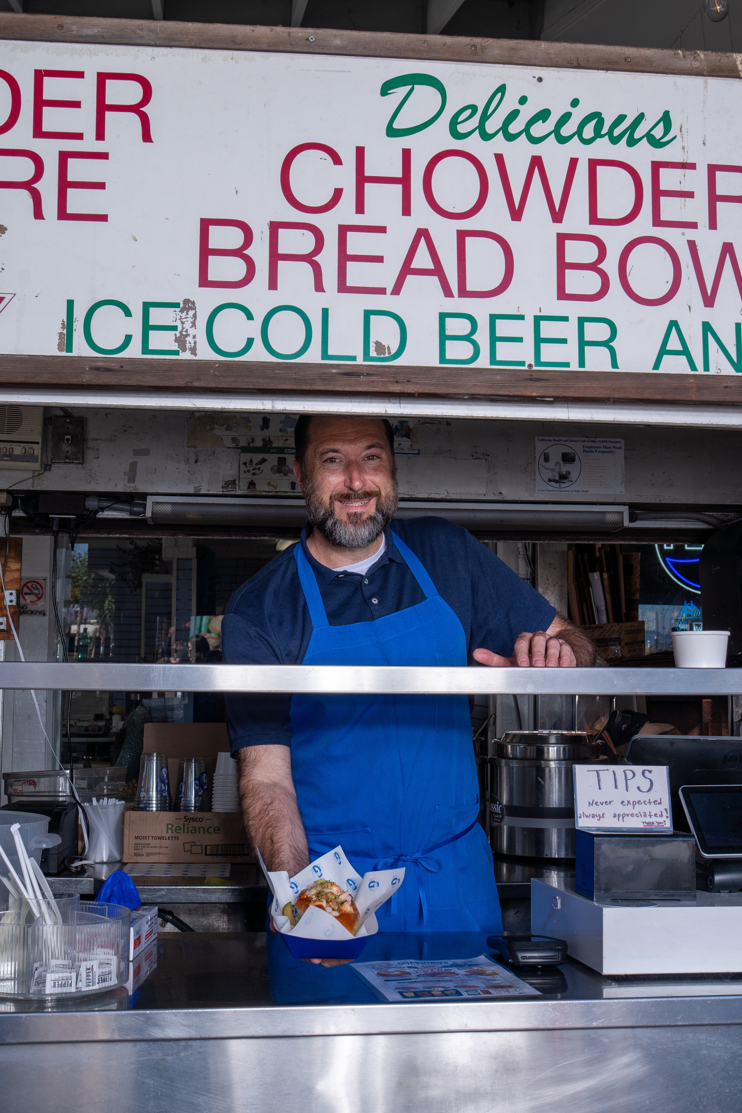Guardino’s chef Matt is serving a clam chowder bread bowl at the Guardino's stand