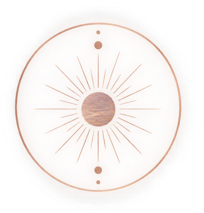 A decorative round icon with a minimalist design, featuring a sunburst pattern in the center, small dots at the top and bottom, and a blurred landscape image in the middle.