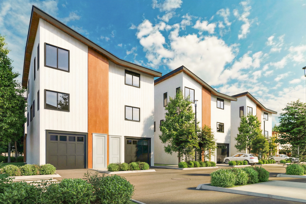 A modern residential apartment complex with white facades, black-framed windows, and wooden accents, surrounded by manicured landscaping and trees, under a partly cloudy blue sky.