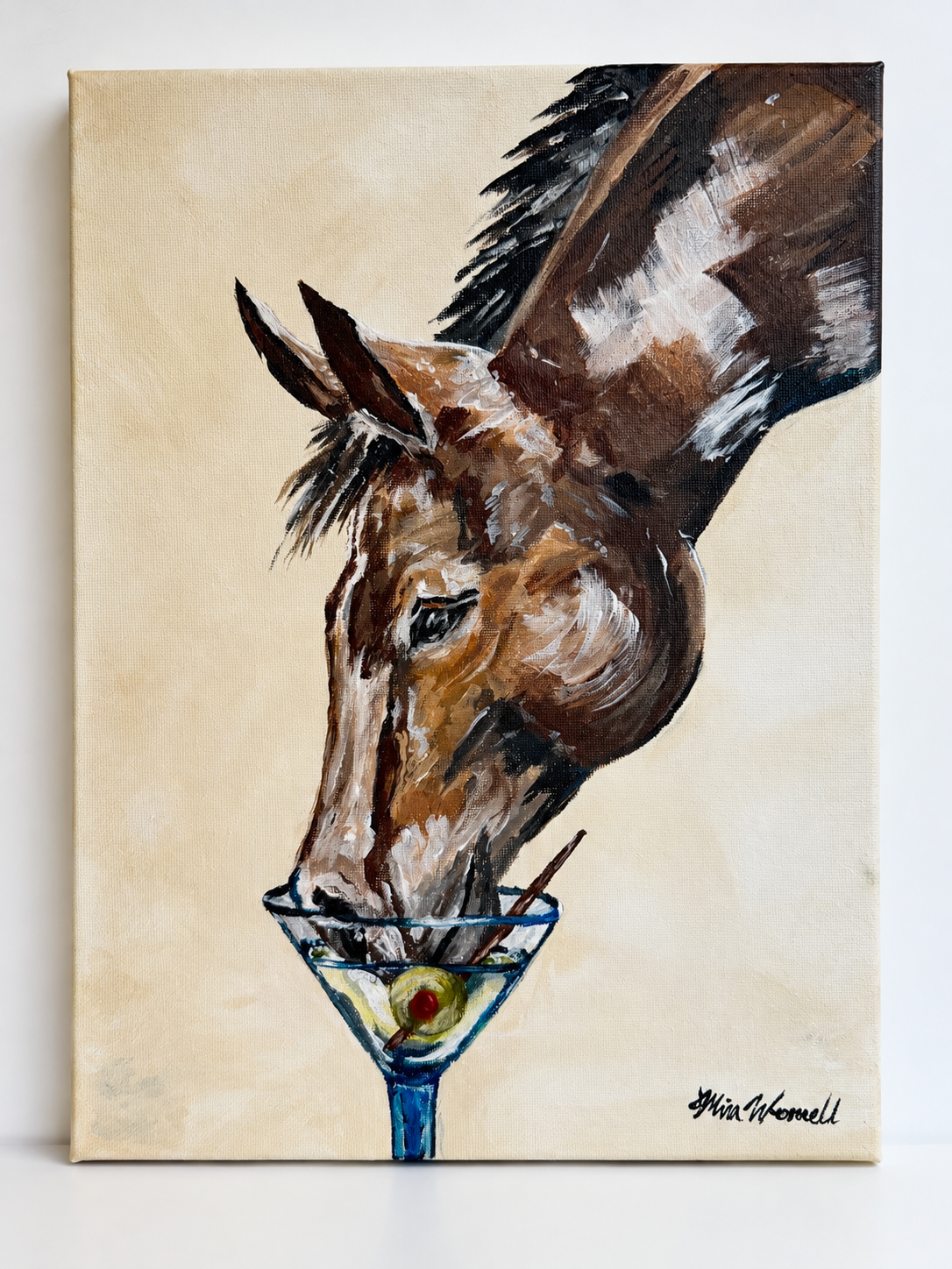 Painting of a horse head in a martini glass with an olive and pick, signed by the artist.