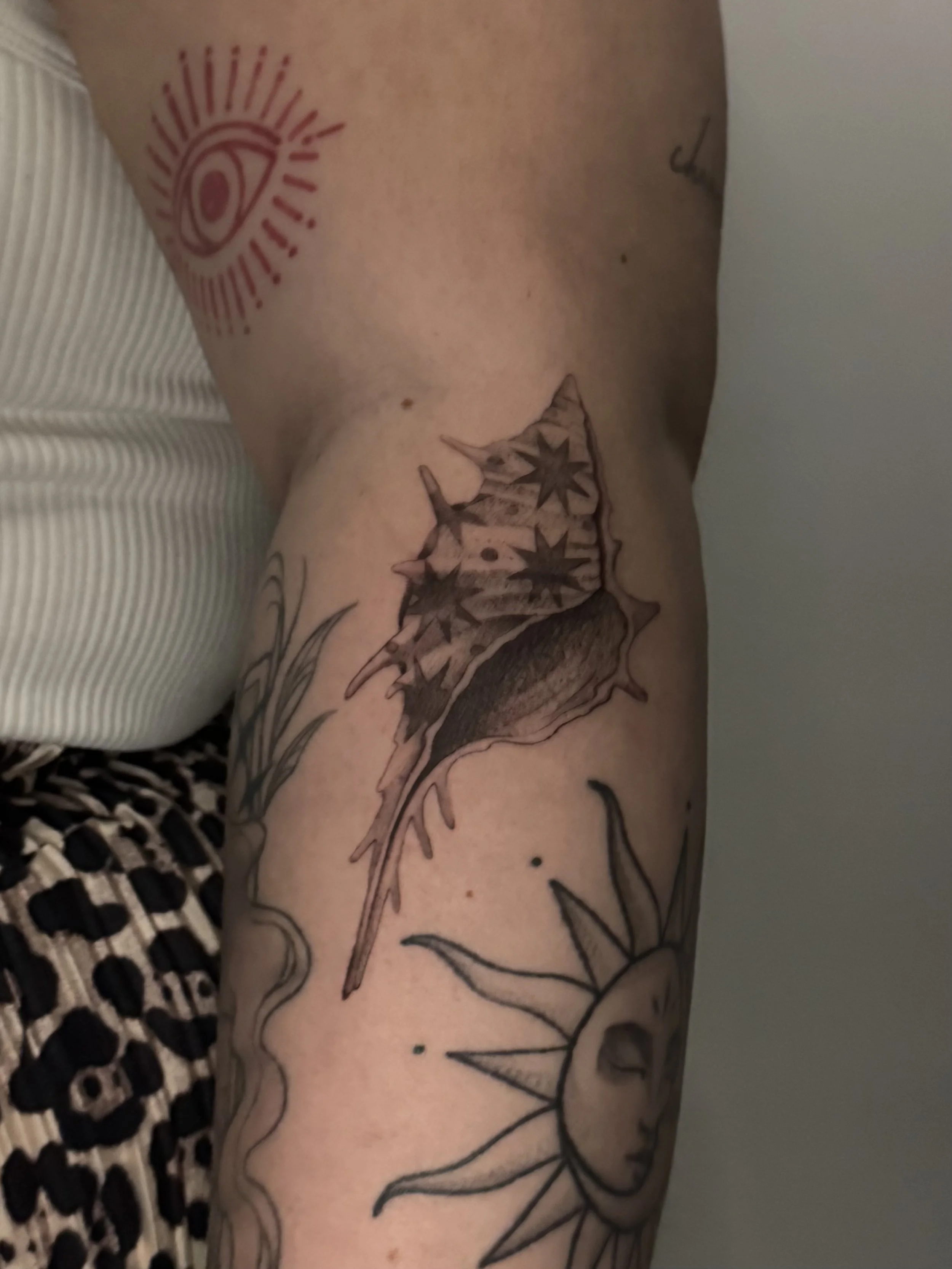 shell tattoo with pattern