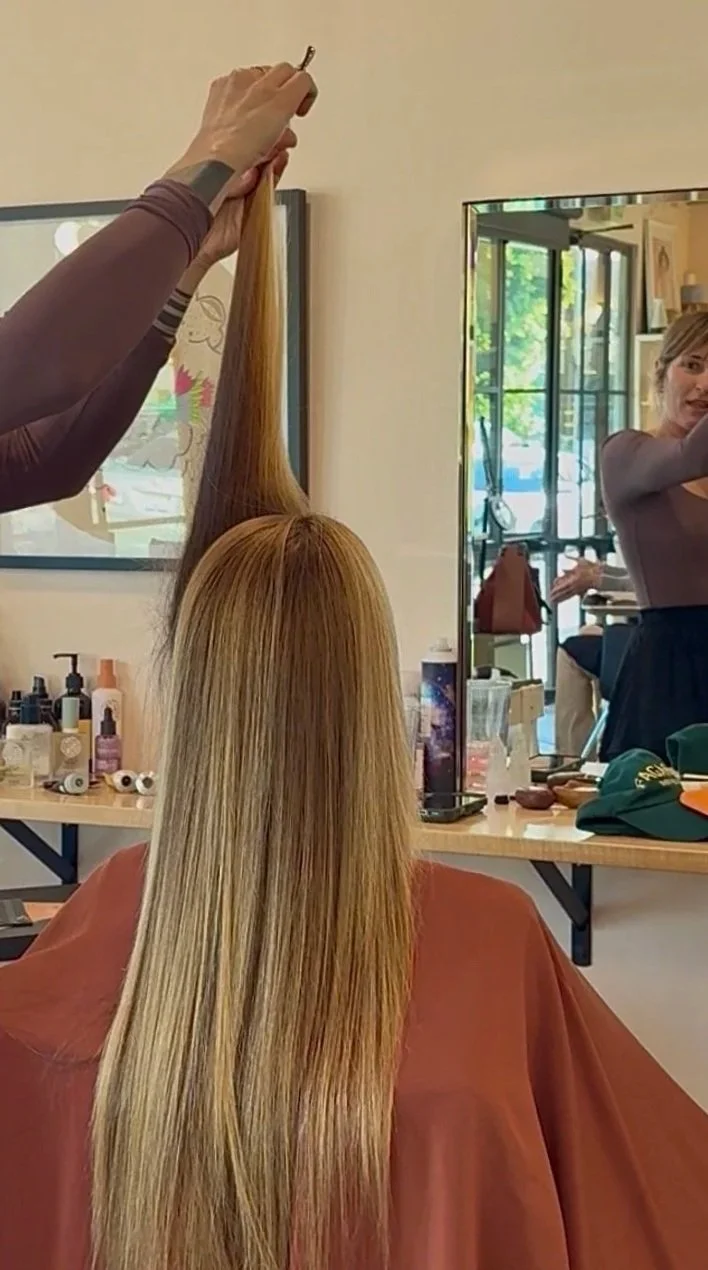 Salon customer with new long natural braids