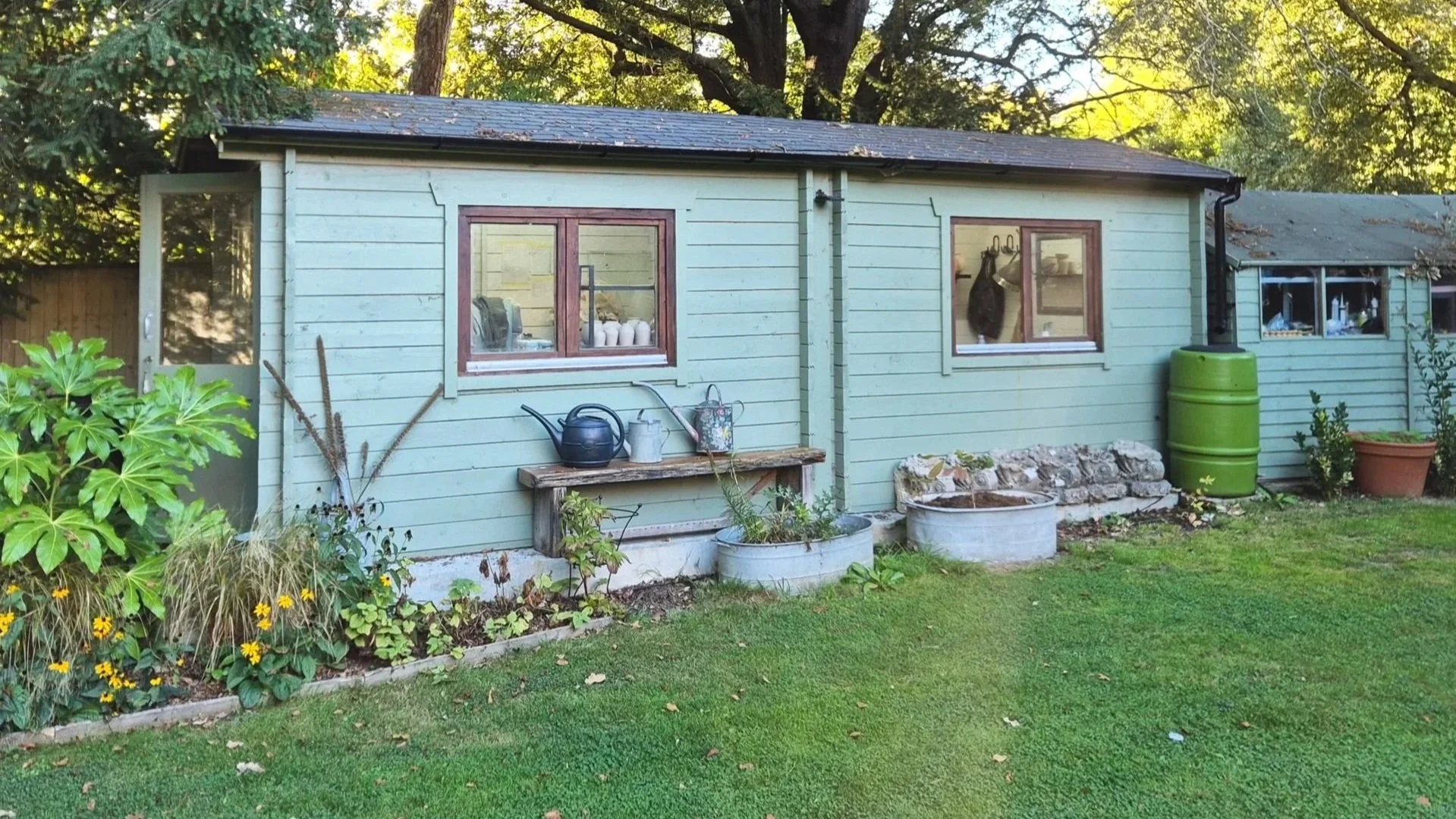 Small ceramic studio in the english countryside. Featuring pottery wheels, glazing areas and trimming and decorations