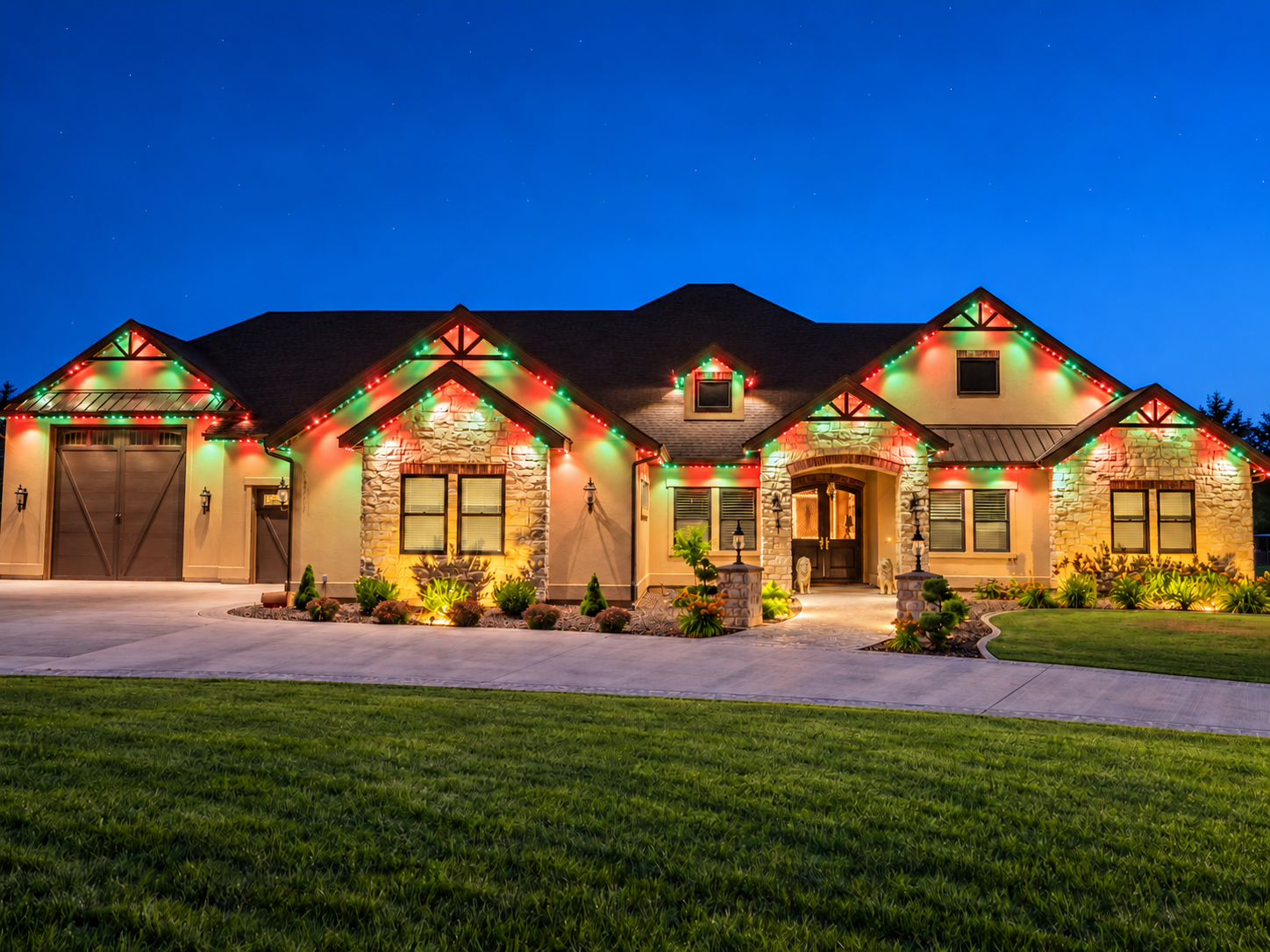 Red and green permanent lights create a Christmas display along a home’s gables and front entrance.