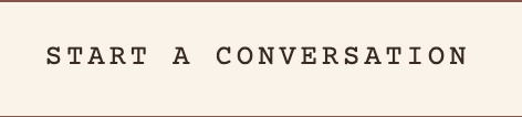 Text on a beige background that reads 'START A CONVERSATION' in uppercase letters.