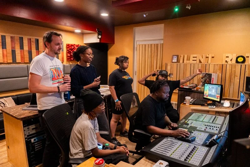 Kids recording in a Detroit music studio