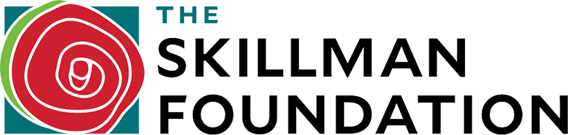 Logo of The Skillman Foundation featuring a red and green stylized rose and black text