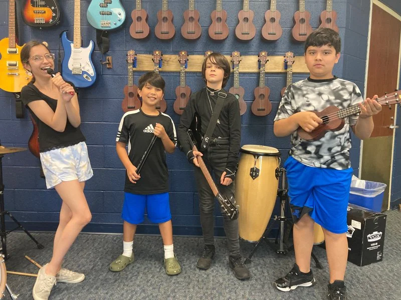 Kids at a Detroit music store