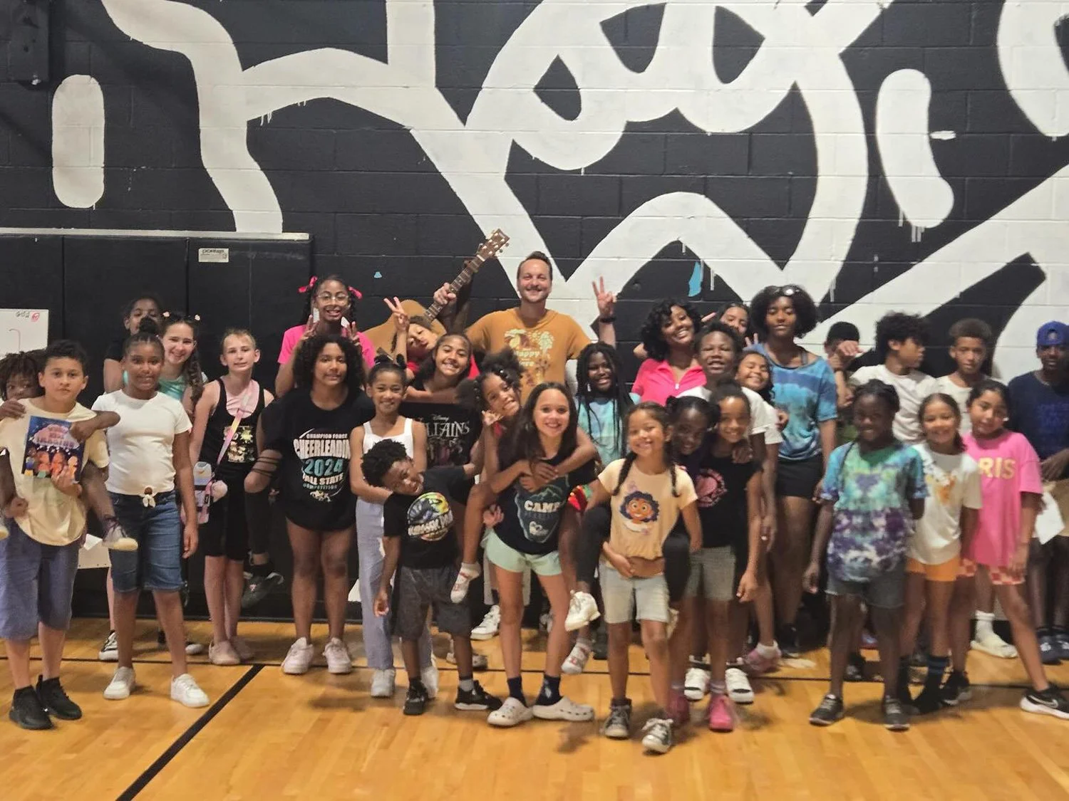 Group of kids in Detroit school music program