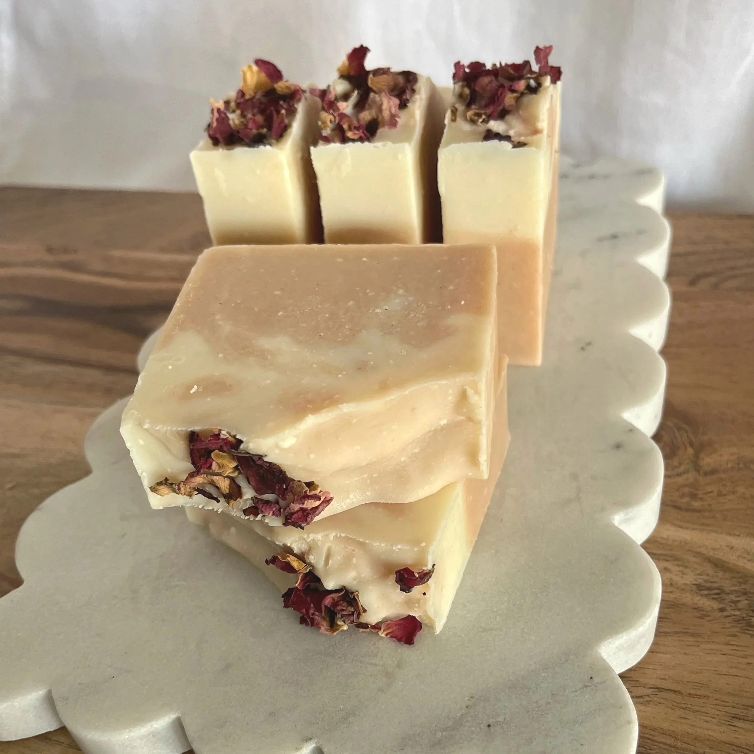 small batch artisan soap with floral details and shea butter