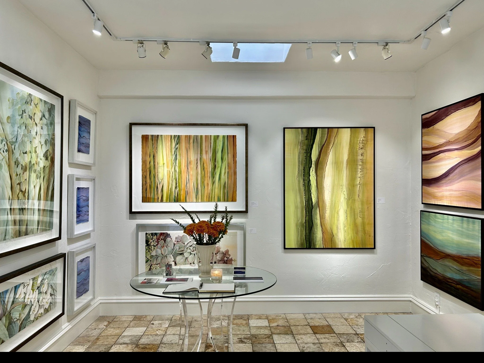 Original watercolors and silk paintings exhibited at Delgado Gallery