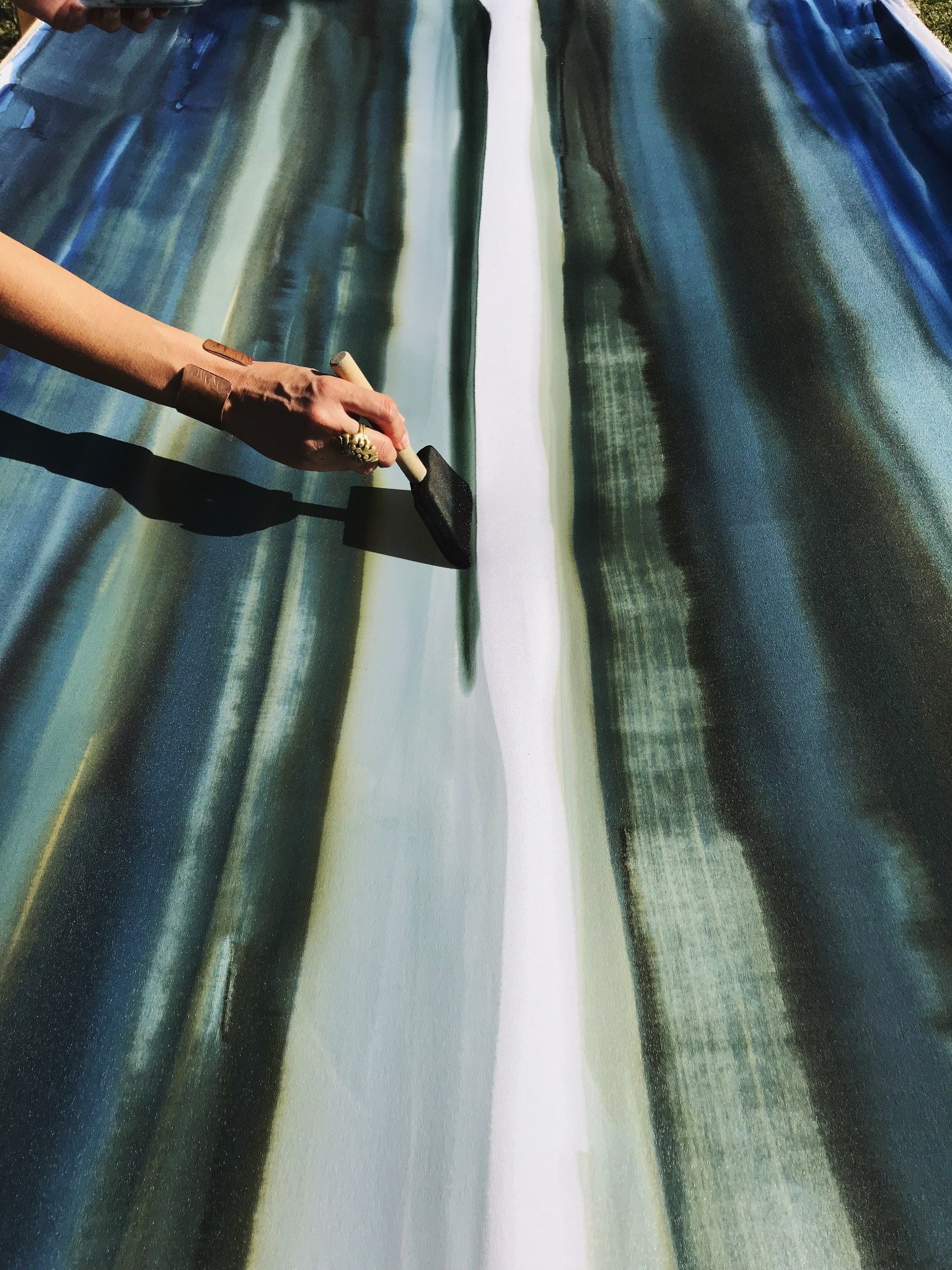 Lisa Rodarte hand painting silk in her Laguna Beach studio