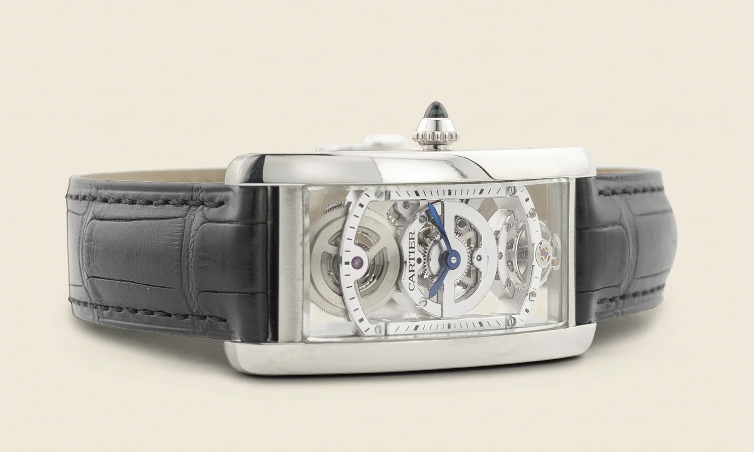 Luxury Cartier wristwatch with a skeleton dial, black leather strap, and a rectangular stainless steel case.