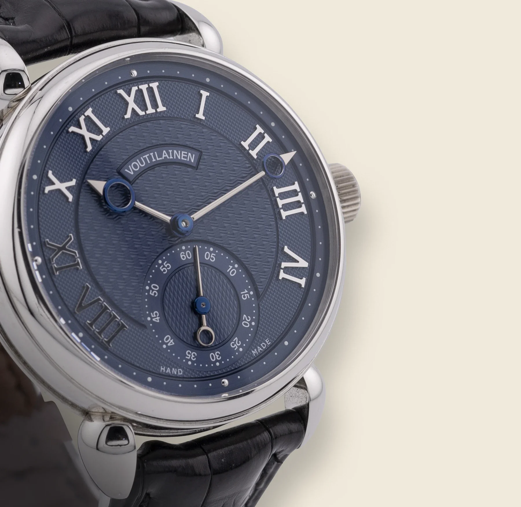 luxury wristwatch with a blue textured dial