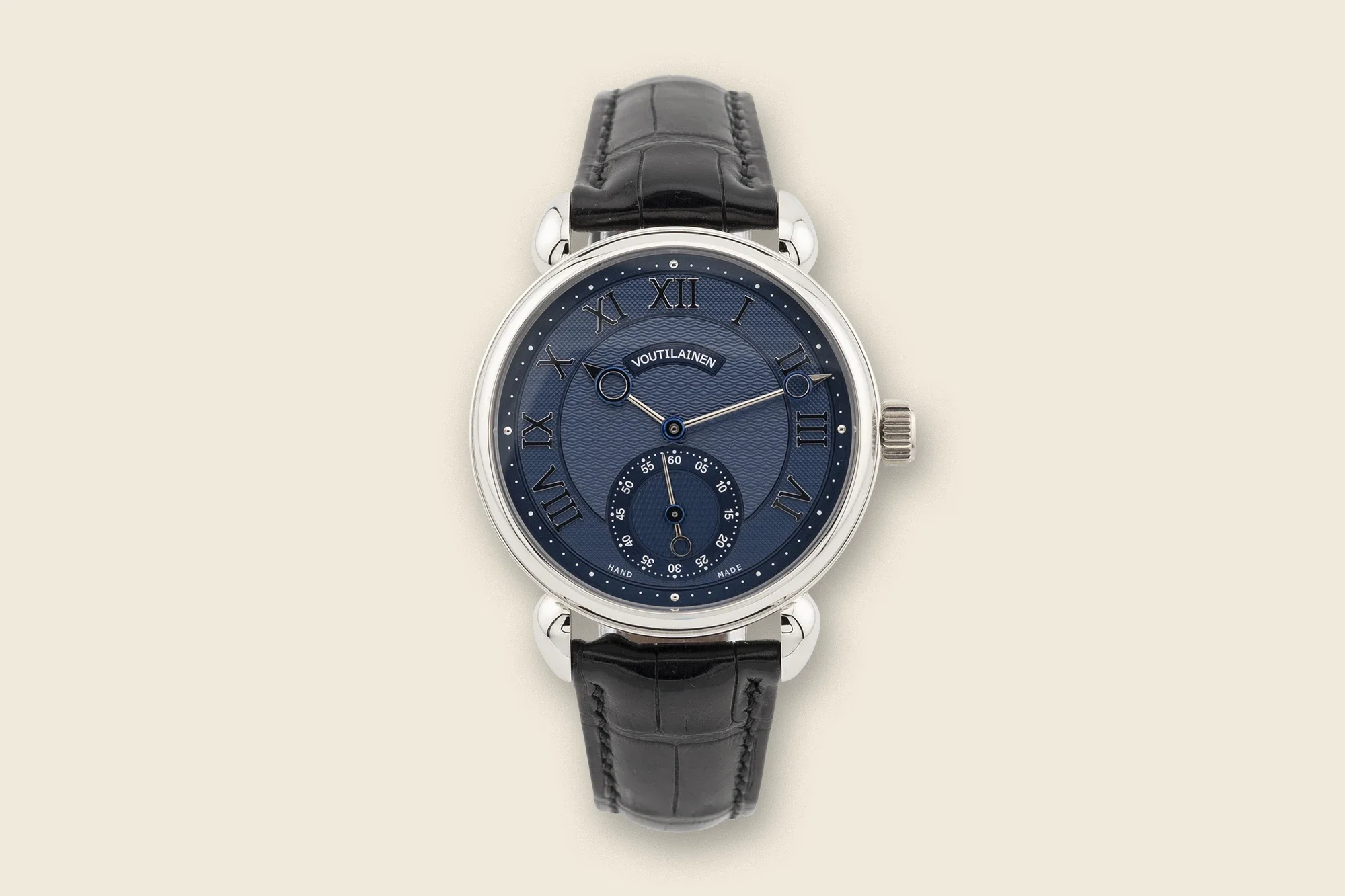 Kari Voutilainen Vingt-8 in platinum with blue dial and small seconds subdial, front view.