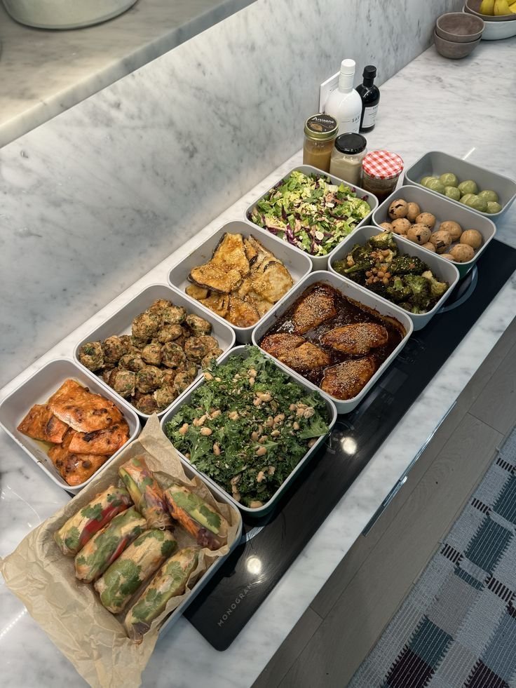 Louisville healthy meal prep containers filled with roasted salmon, green beans, and roasted potatoes. health conscious meal prep in Louisville.